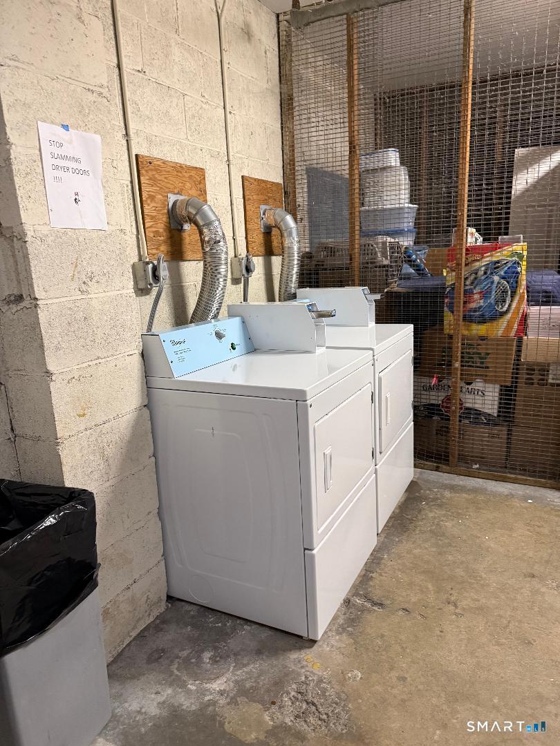 1 Beaver Brook Road, Unit 29 Danbury, CT 06810 - Photo 10 of 16 a utility room with dryer and washer