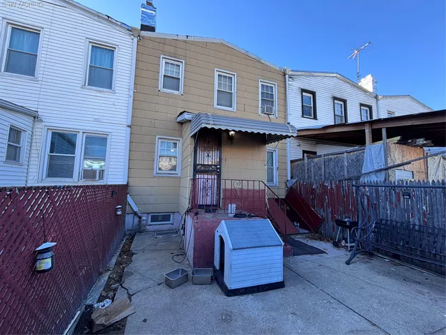 a view of a house with a garage