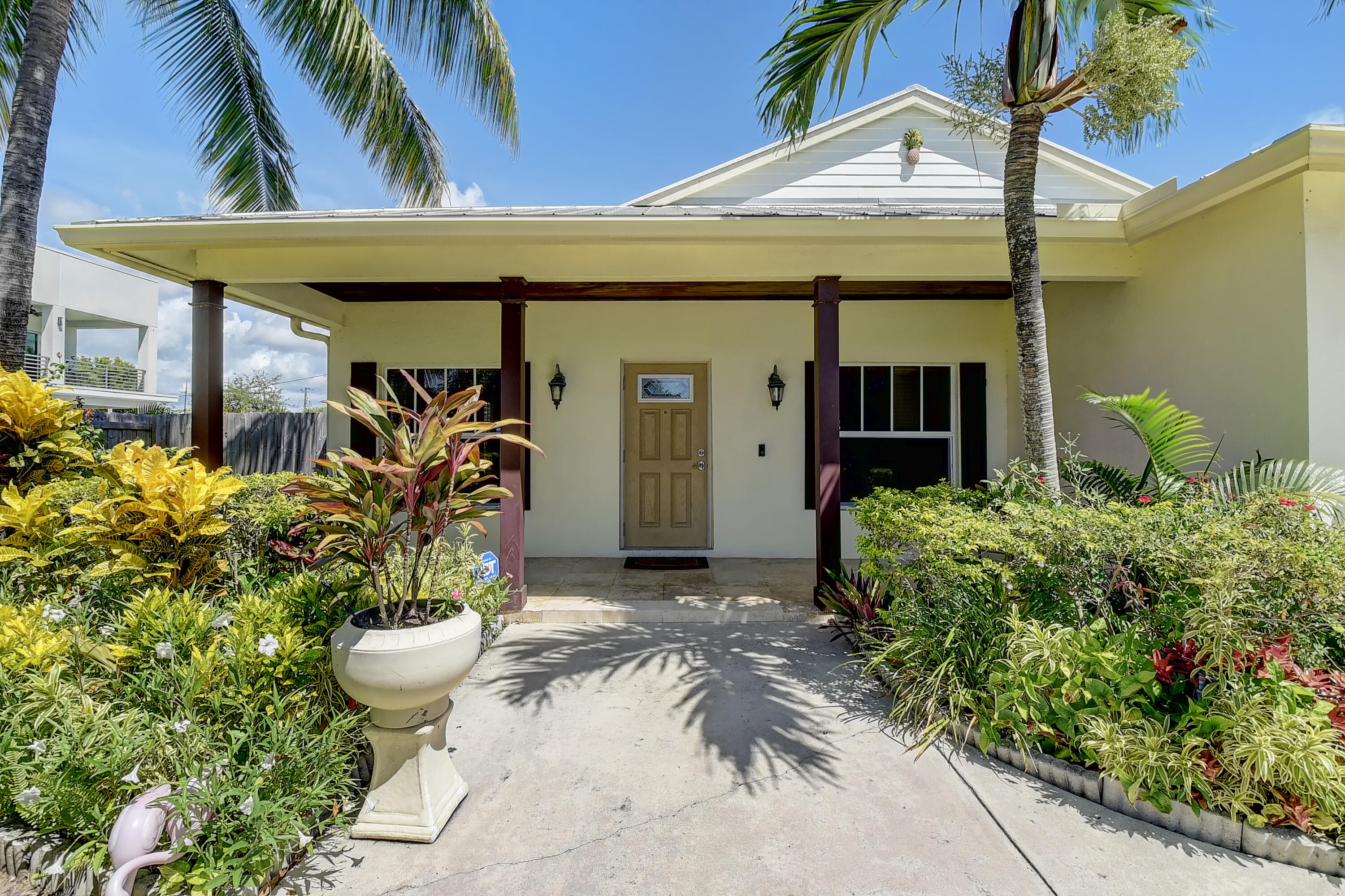 a view of a room with potted plants