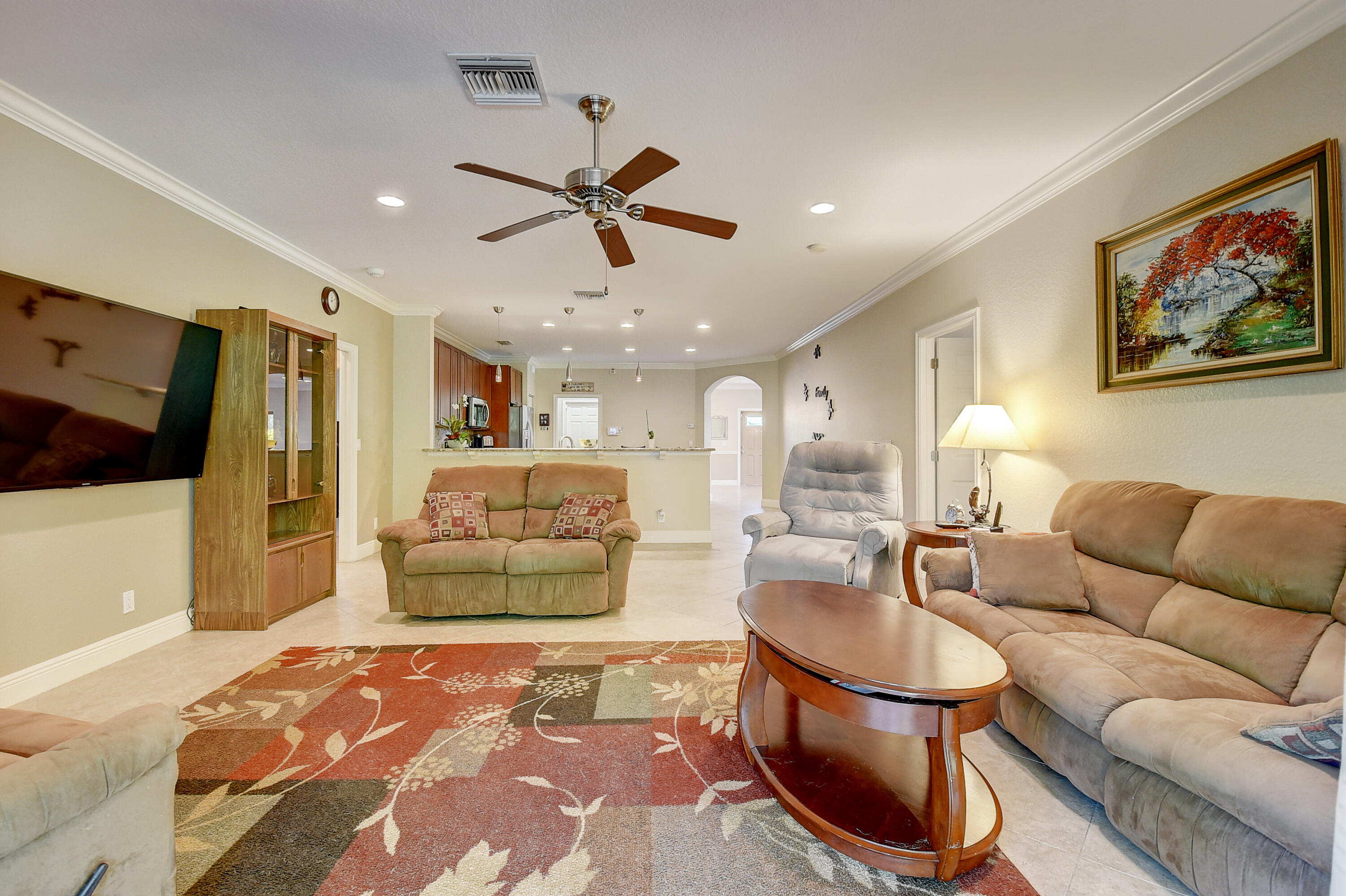215 Gulfstream Boulevard Boynton Beach, FL 33435 - Photo 18 of 39 a living room with furniture and a rug
