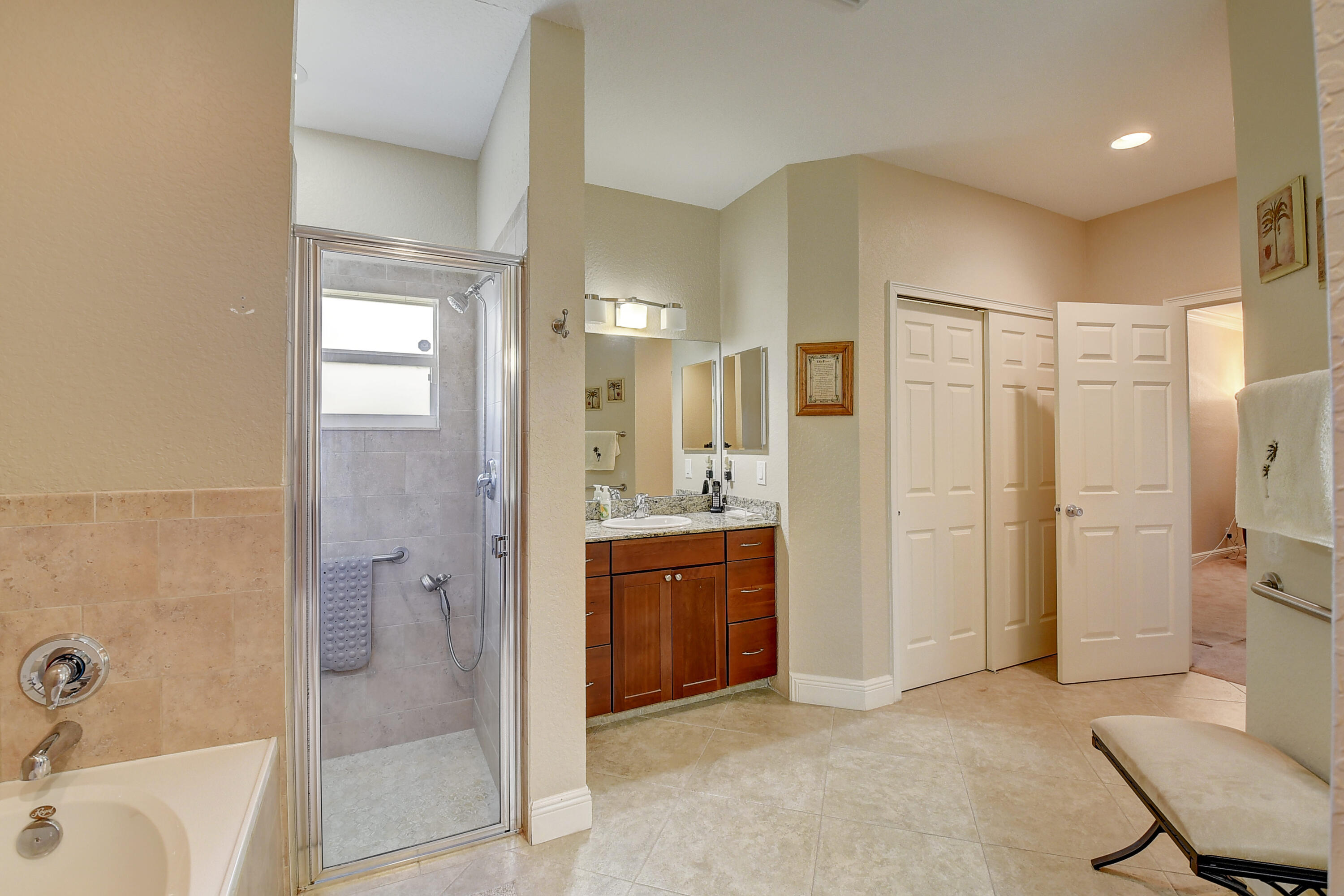 215 Gulfstream Boulevard Boynton Beach, FL 33435 - Photo 25 of 39 a bathroom with a bathtub shower sink and toilet