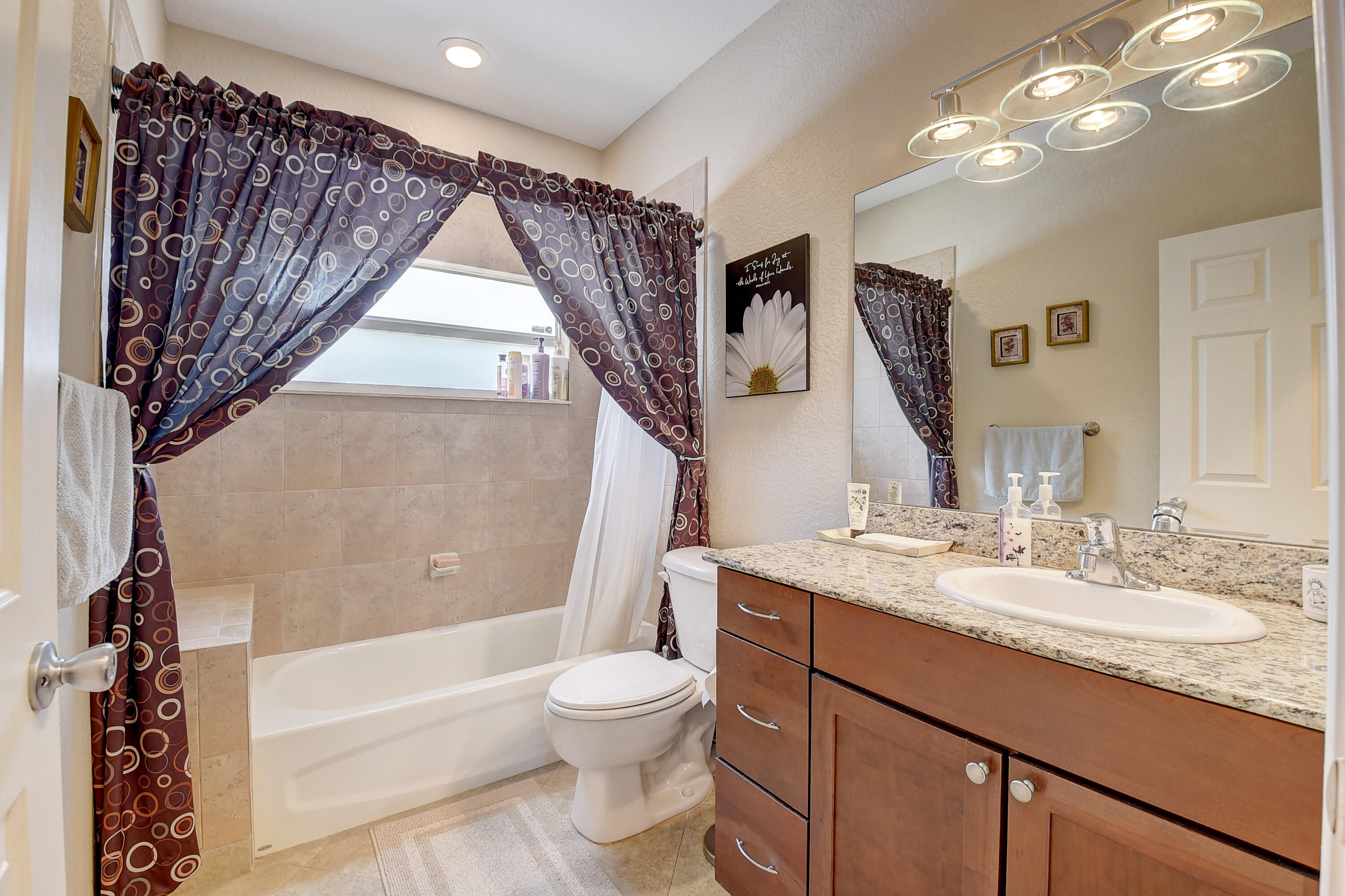 215 Gulfstream Boulevard Boynton Beach, FL 33435 - Photo 28 of 39 a bathroom with a granite countertop sink toilet and shower