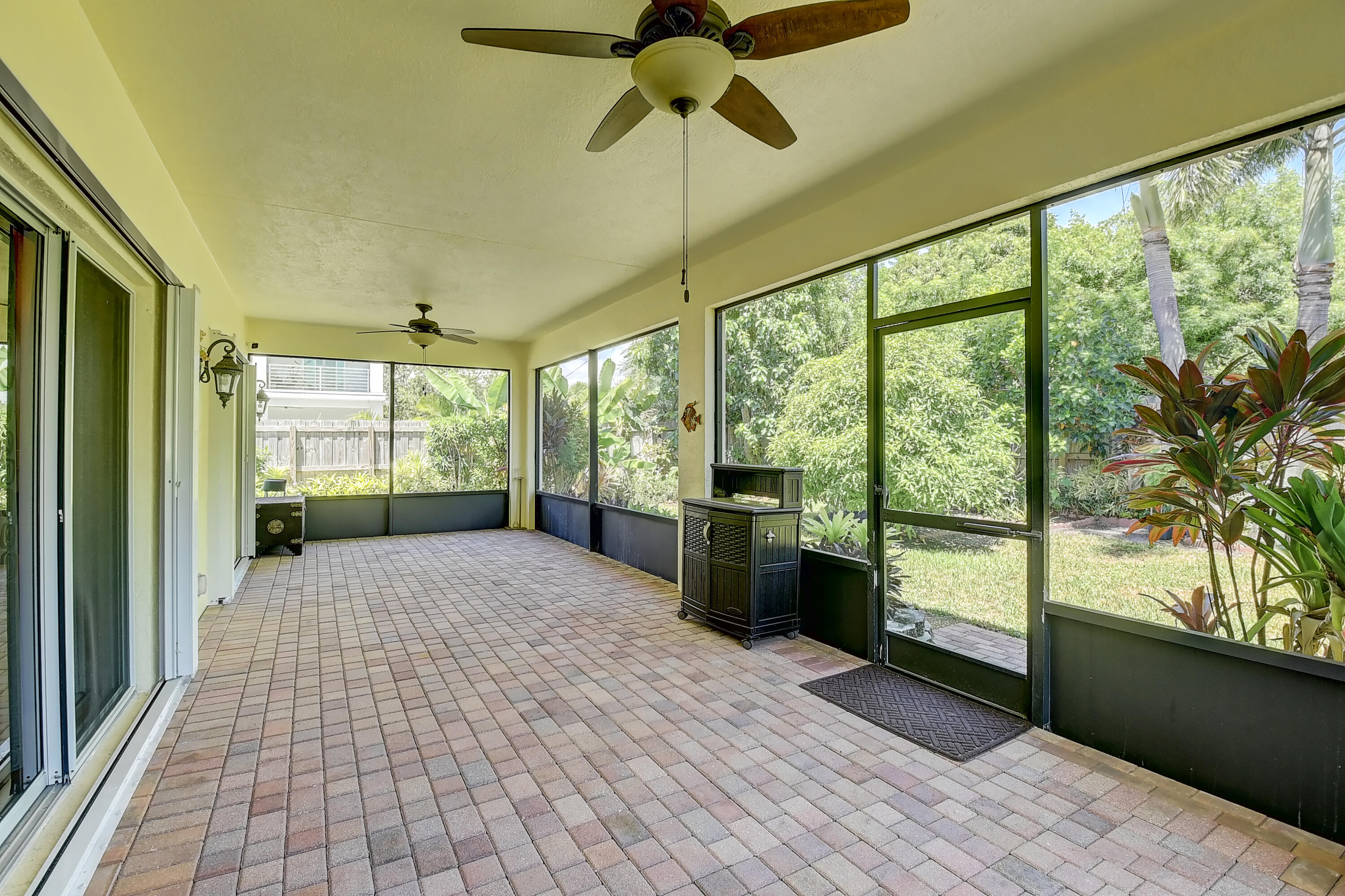 215 Gulfstream Boulevard Boynton Beach, FL 33435 - Photo 36 of 39 a view of empty room with wooden floor and fan