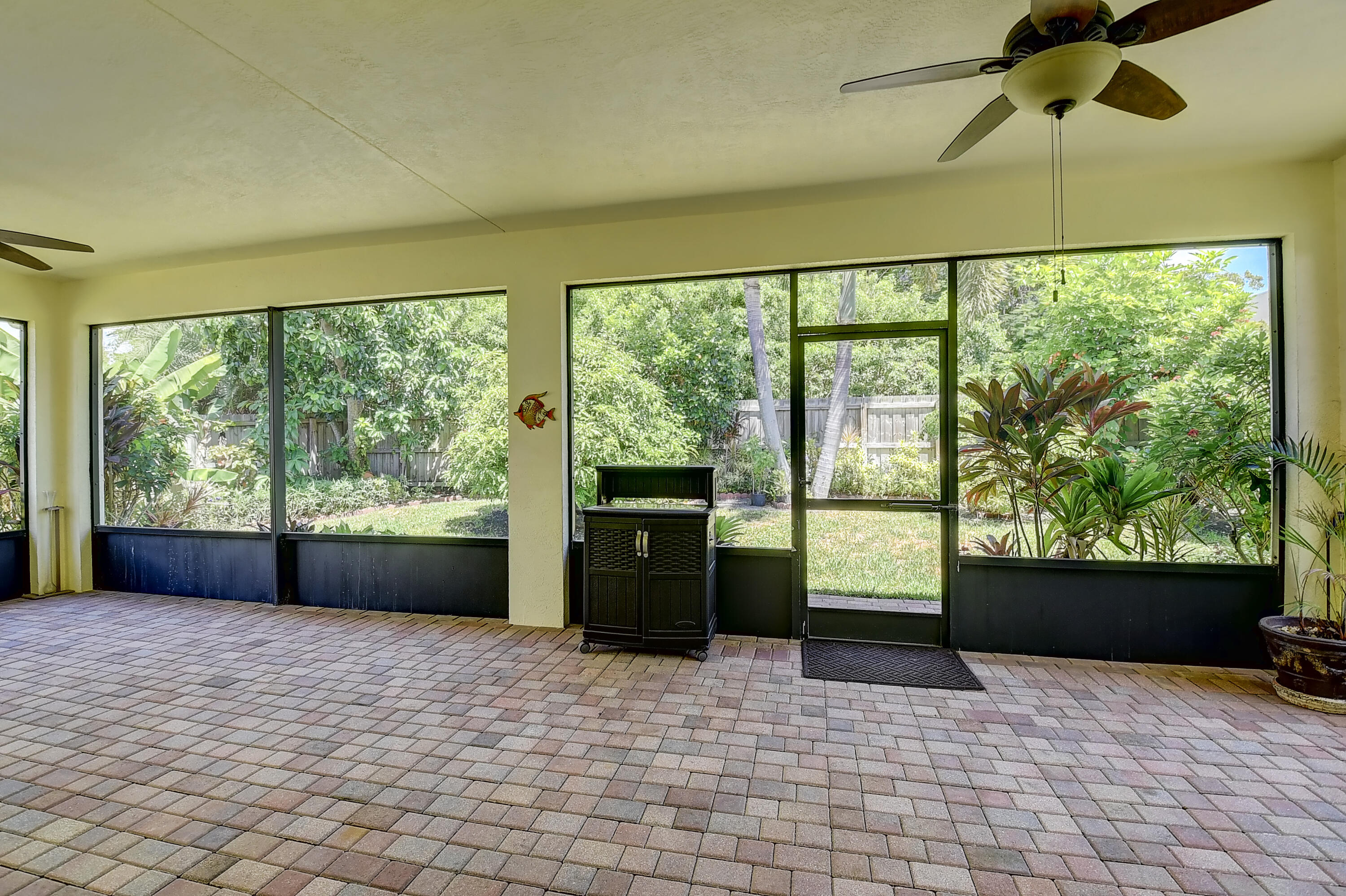 215 Gulfstream Boulevard Boynton Beach, FL 33435 - Photo 37 of 39 a view of empty room with a fireplace and windows