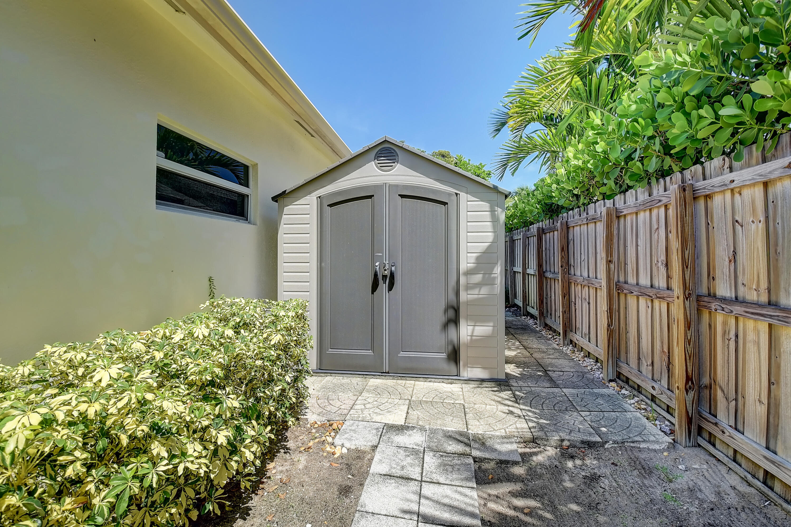 215 Gulfstream Boulevard Boynton Beach, FL 33435 - Photo 38 of 39 a view of a house with a yard and plants