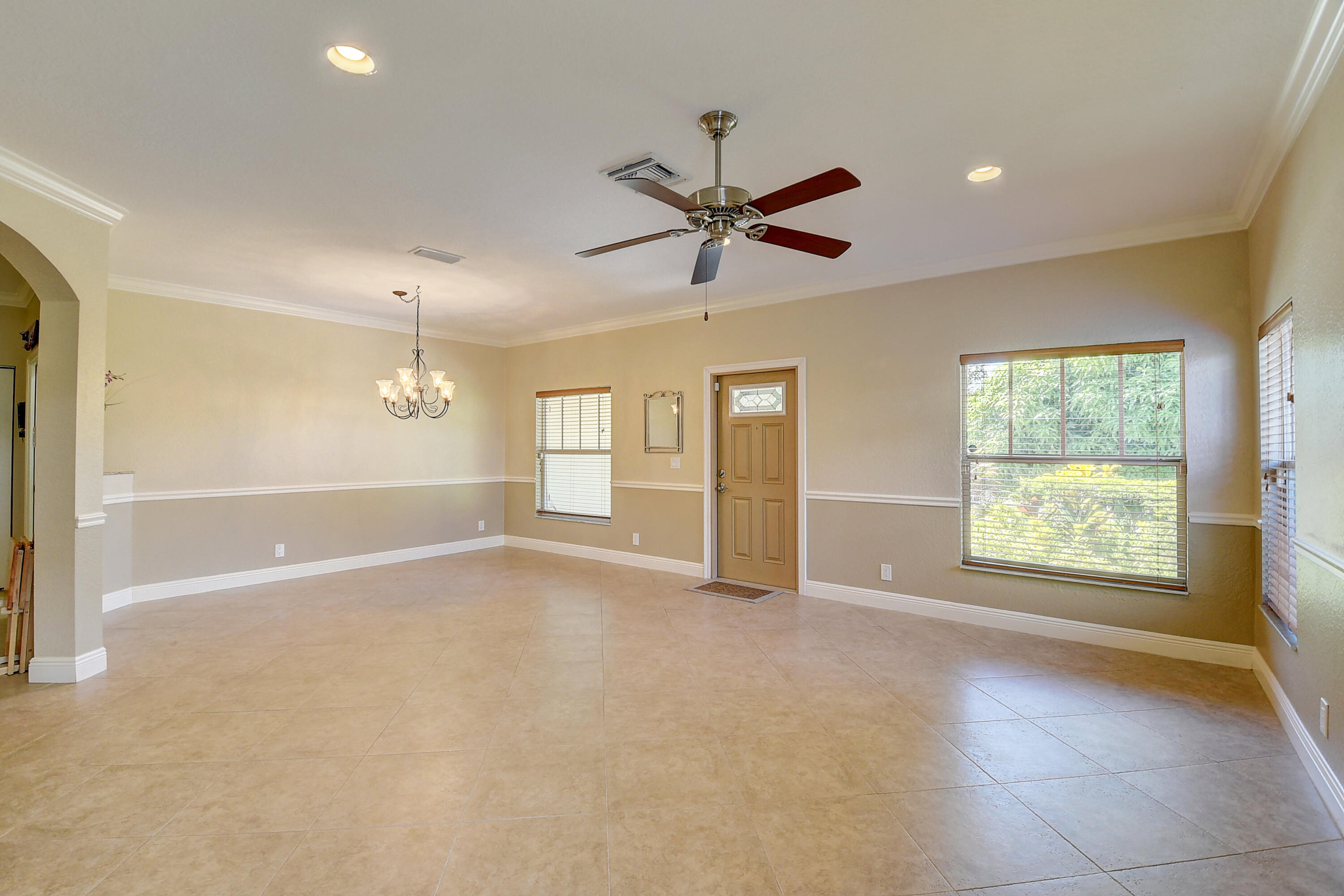 215 Gulfstream Boulevard Boynton Beach, FL 33435 - Photo 6 of 39 a view of an empty room with a window
