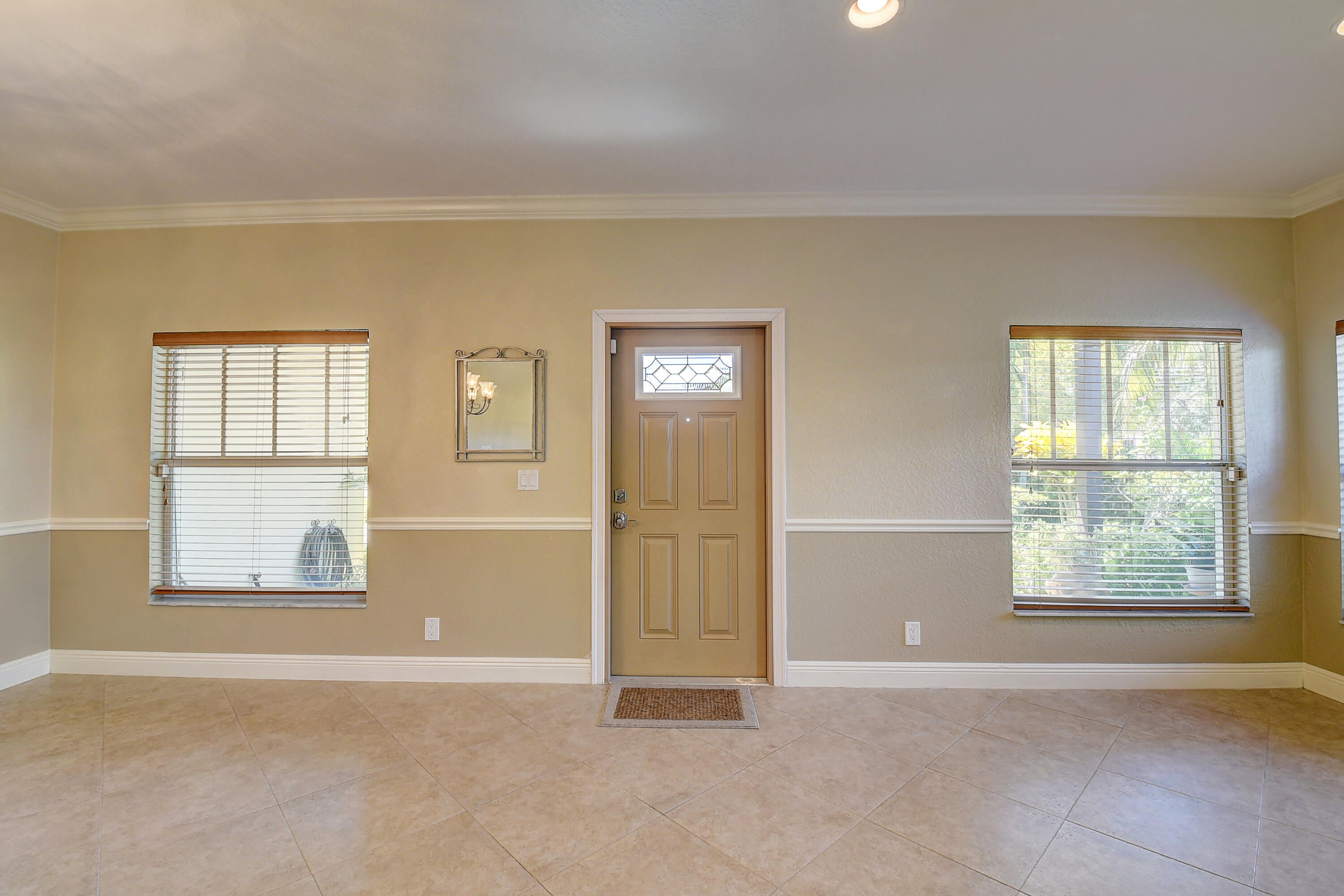 215 Gulfstream Boulevard Boynton Beach, FL 33435 - Photo 8 of 39 an empty room with windows and closet