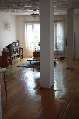 Undisclosed Address Chicago, IL 60642 - Photo 14 of 16 a living room with furniture window and wooden floor