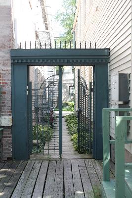 Undisclosed Address Chicago, IL 60642 - Photo 2 of 16 a view of a balcony with wooden floor