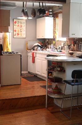Undisclosed Address Chicago, IL 60642 - Photo 8 of 16 a kitchen with stainless steel appliances granite countertop a stove a sink and a microwave