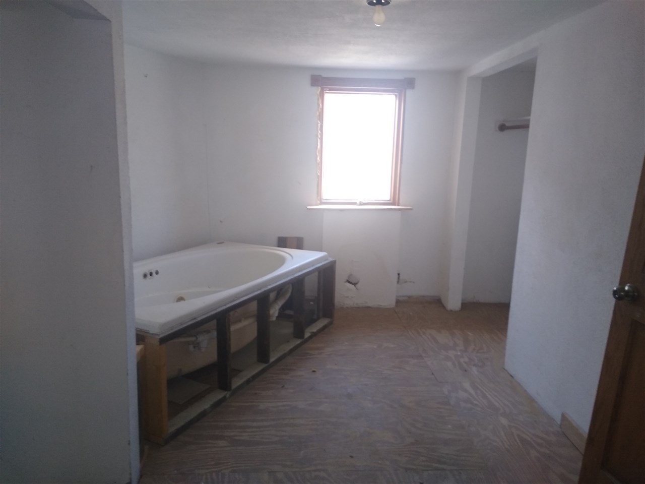 4025 River Road Cherry Valley, IL 61016 - Photo 6 of 10 a view of a room with a baby crib and a window