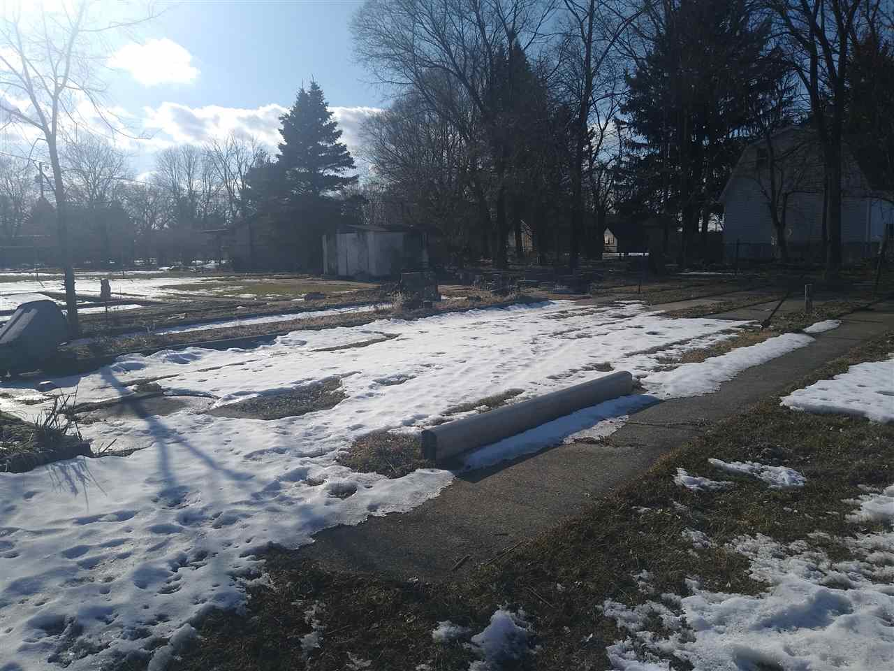 4025 River Road Cherry Valley, IL 61016 - Photo 9 of 10 a view of dirt yard with a large tree