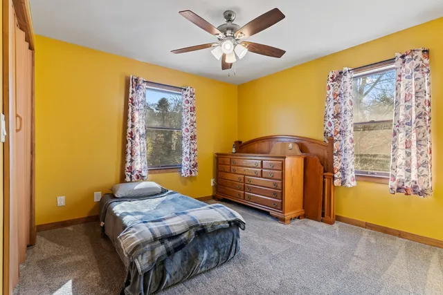 a view of a storage and utility room with washer and dryer
