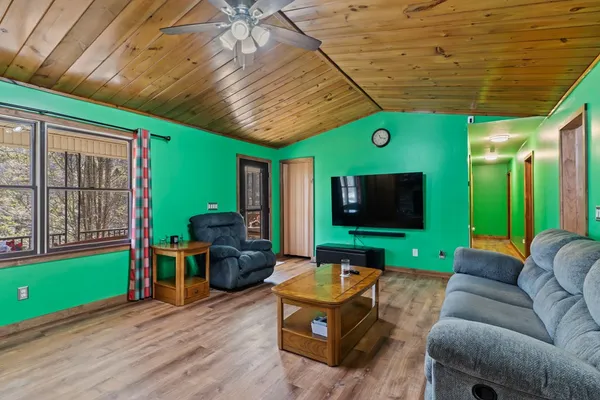 a kitchen with stainless steel appliances granite countertop a refrigerator a stove top oven a sink and dishwasher