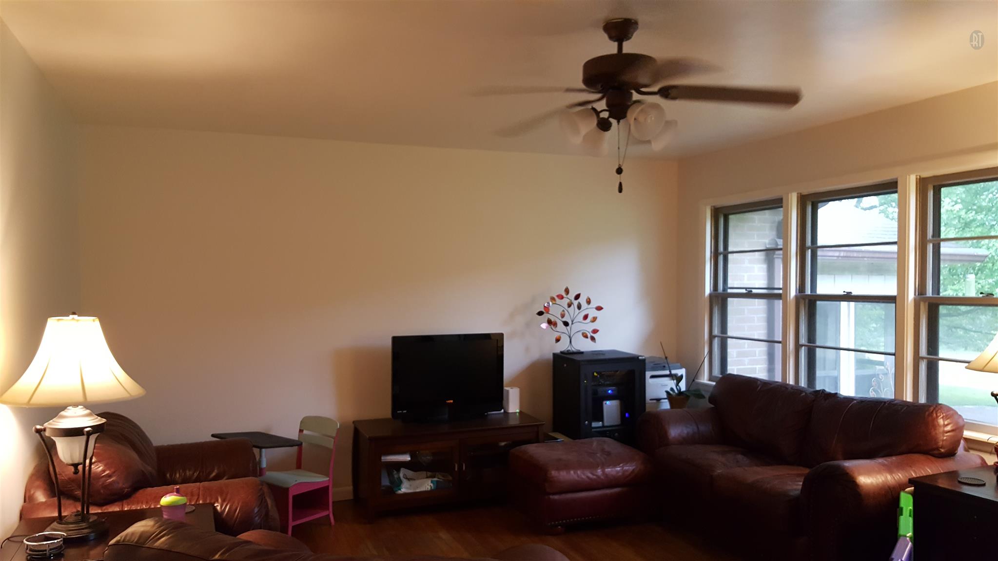 1232 Cliff Amos Road Spring Hill, TN 37174 - Photo 18 of 23 a living room with furniture and a lamp