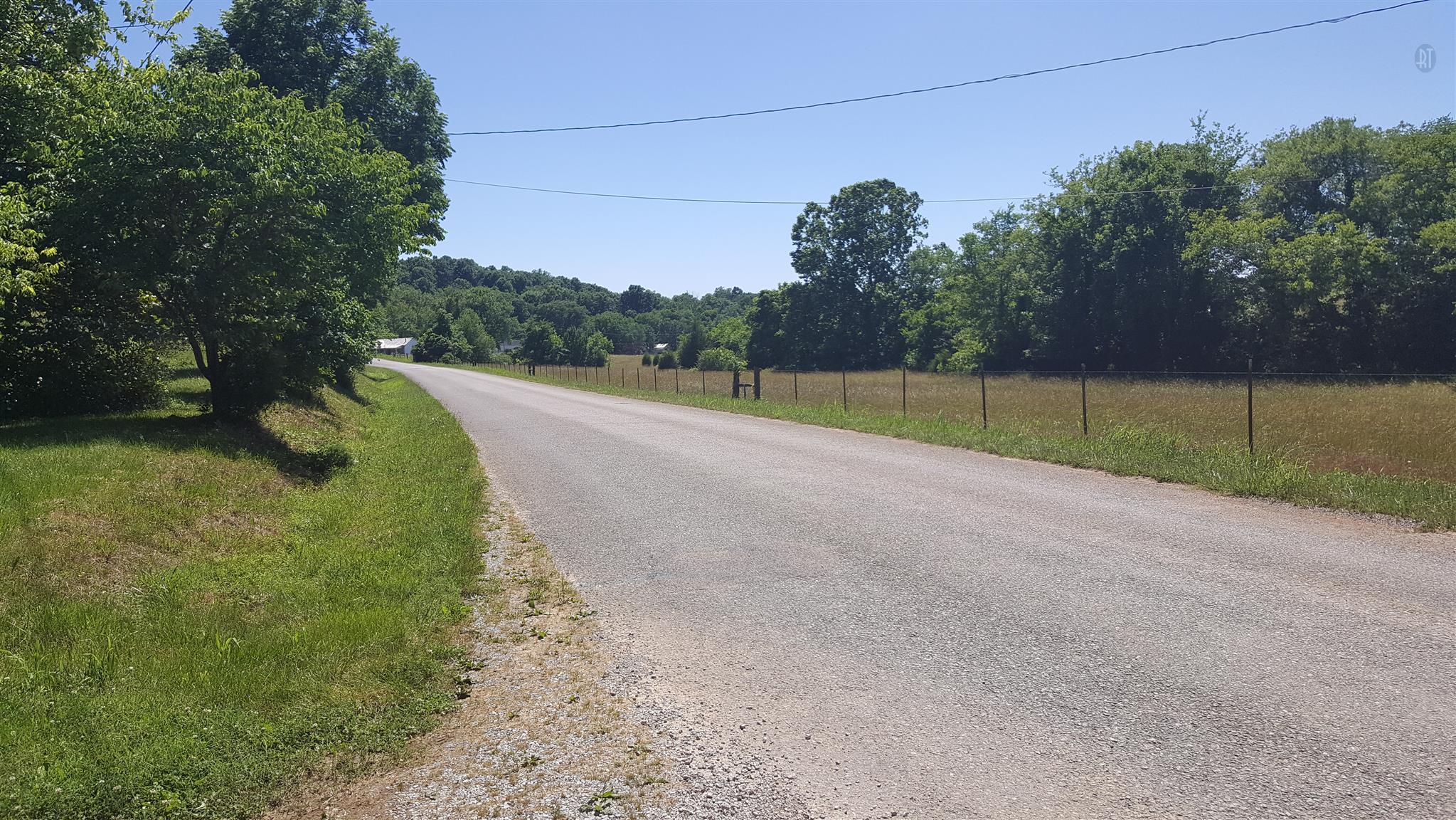1232 Cliff Amos Road Spring Hill, TN 37174 - Photo 2 of 23 a view of a field with a tree in the background