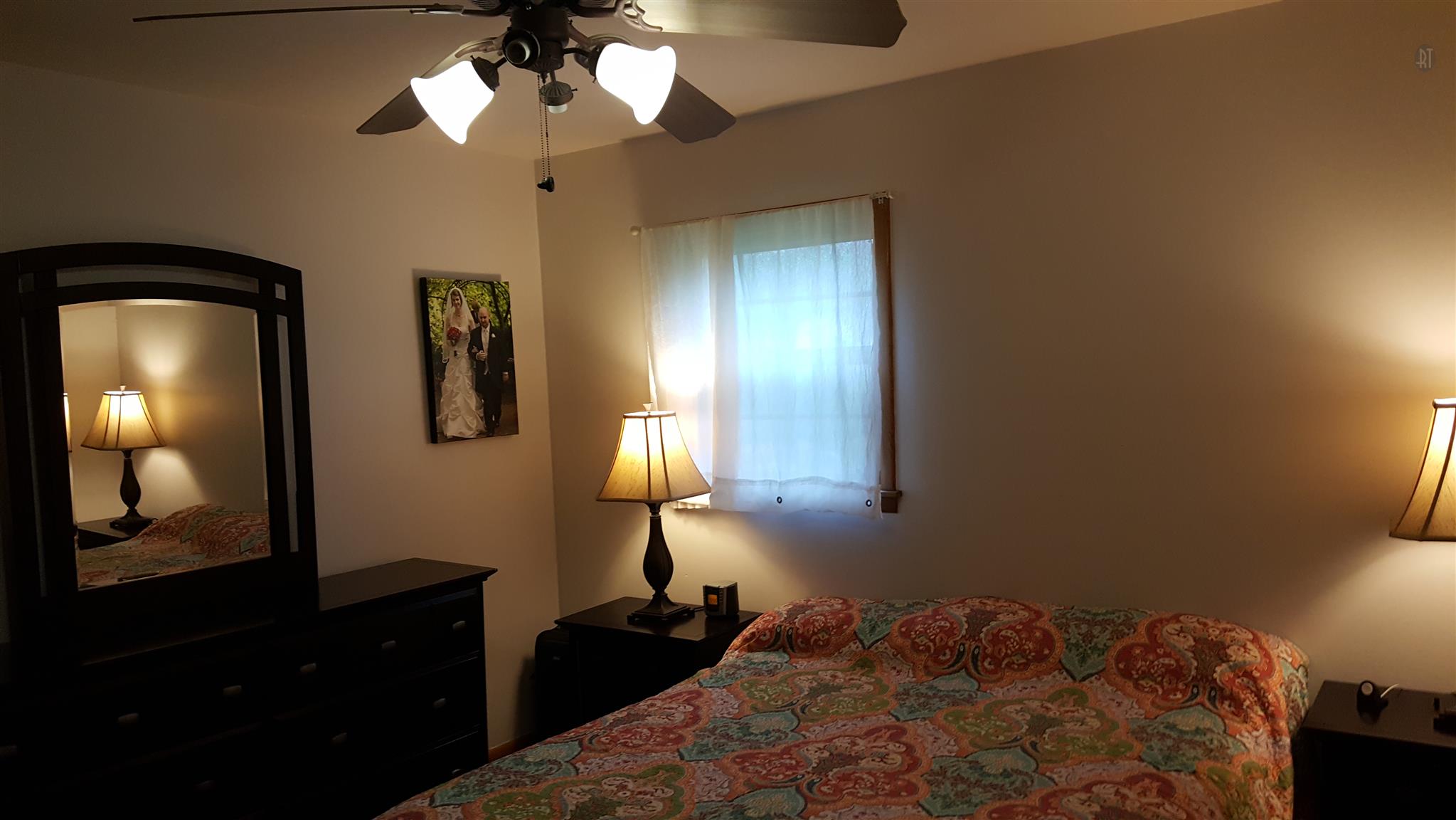 1232 Cliff Amos Road Spring Hill, TN 37174 - Photo 6 of 23 a bedroom with a bed and a mirror on dresser
