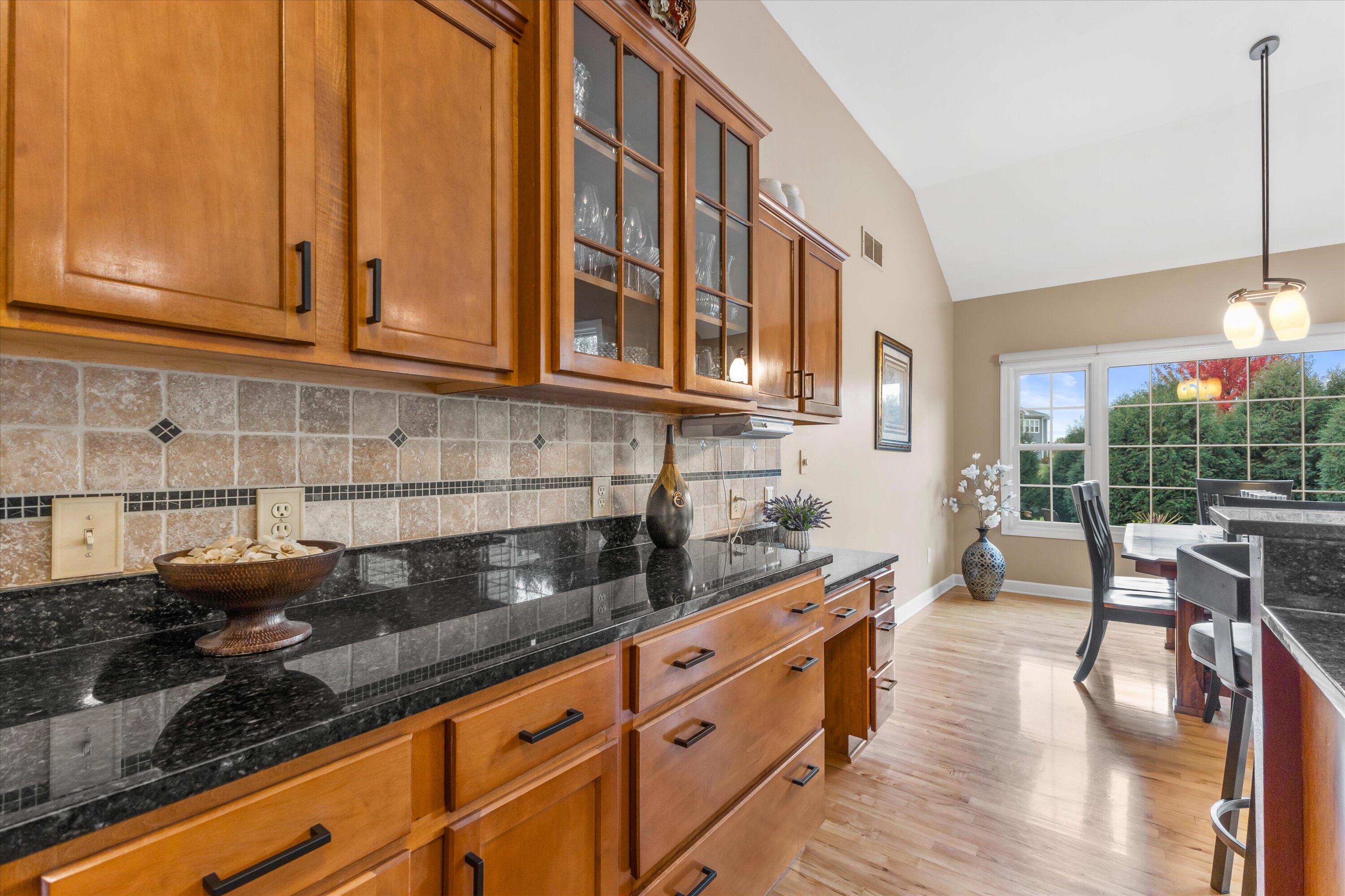 9611 82nd Place Pleasant Prairie, WI 53158 - Photo 9 of 52 Tile backsplash.