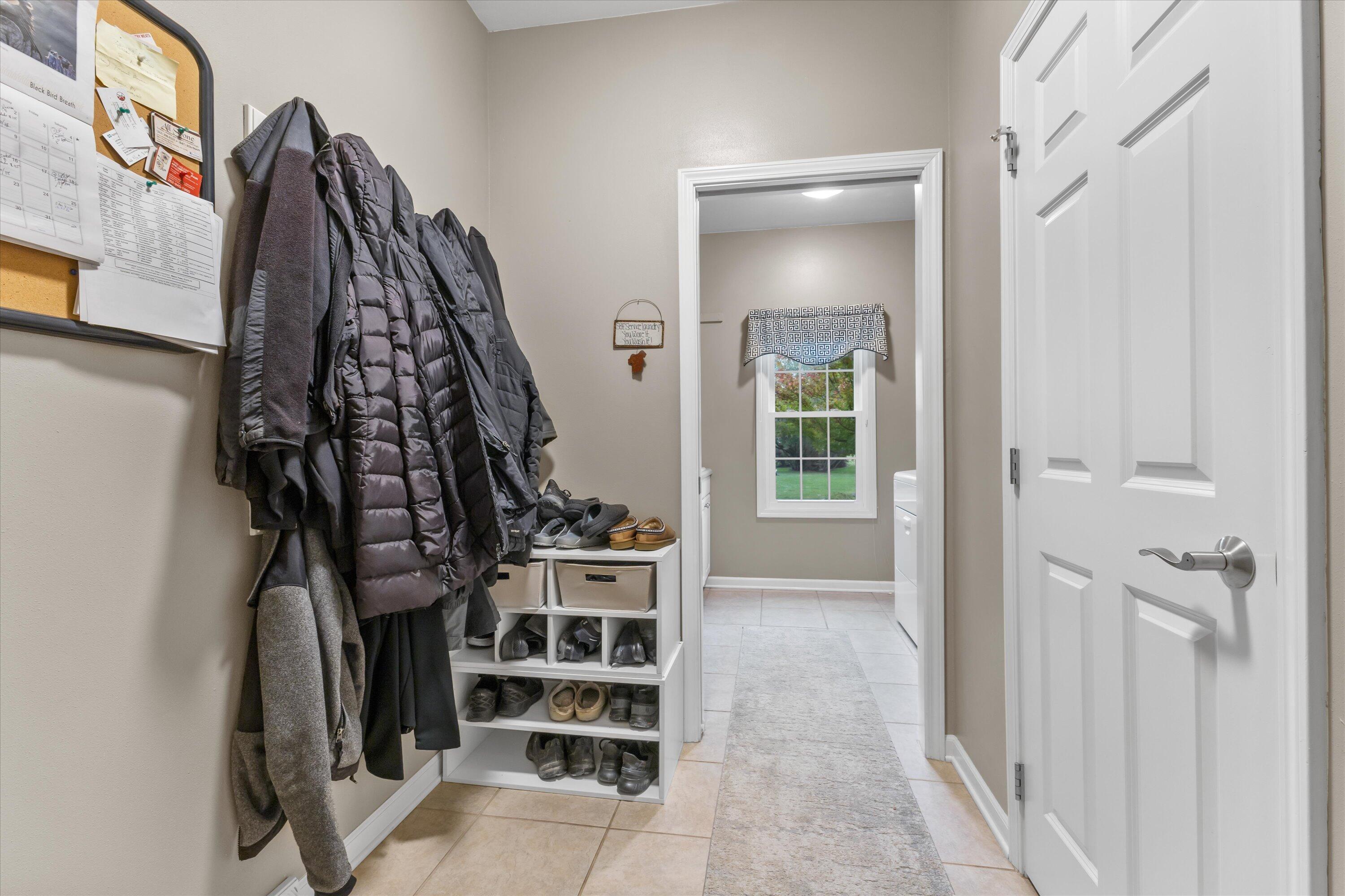 9611 82nd Place Pleasant Prairie, WI 53158 - Photo 22 of 52 Door leads to half bath.