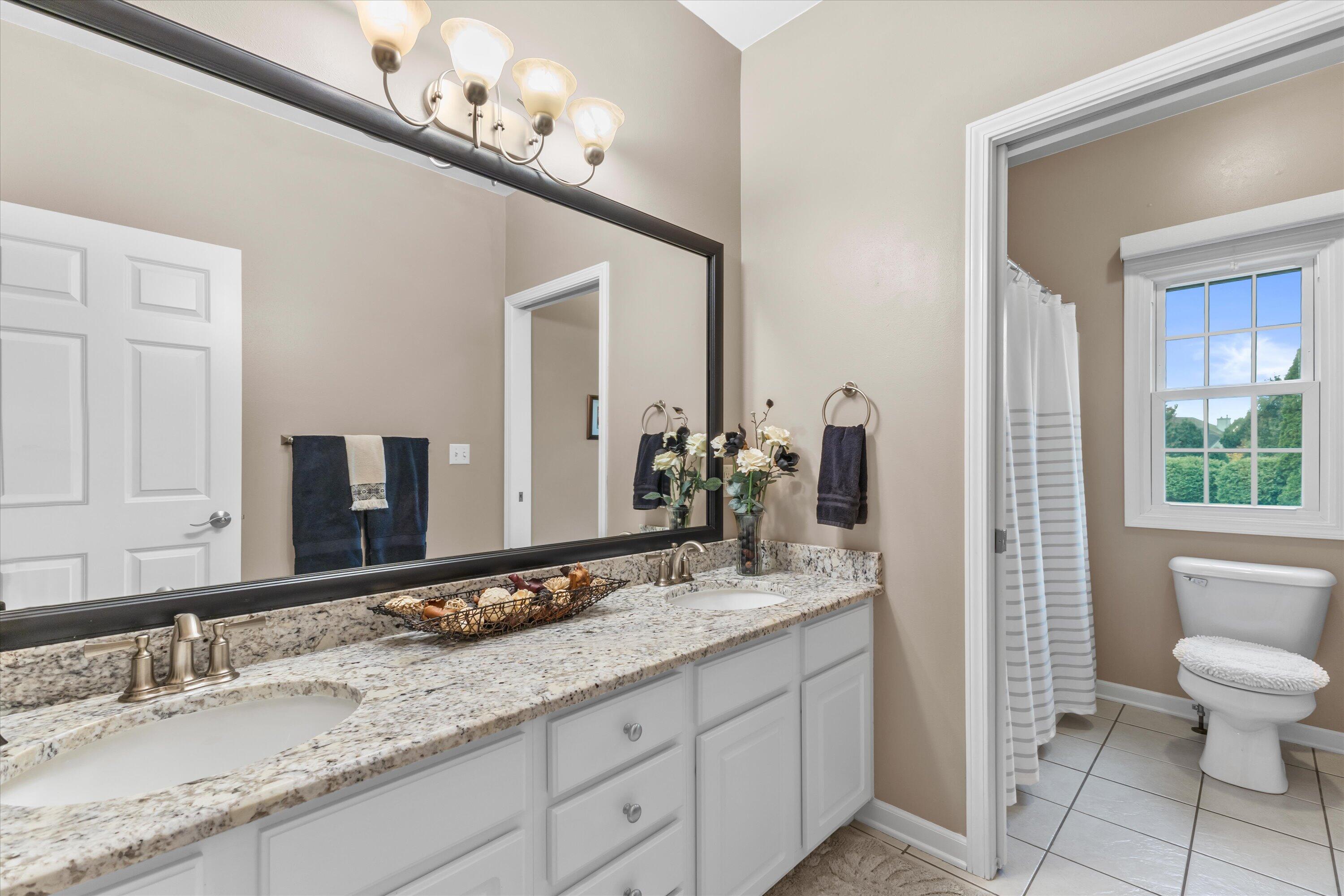 9611 82nd Place Pleasant Prairie, WI 53158 - Photo 31 of 52 dual sinks, granite, shower over tub