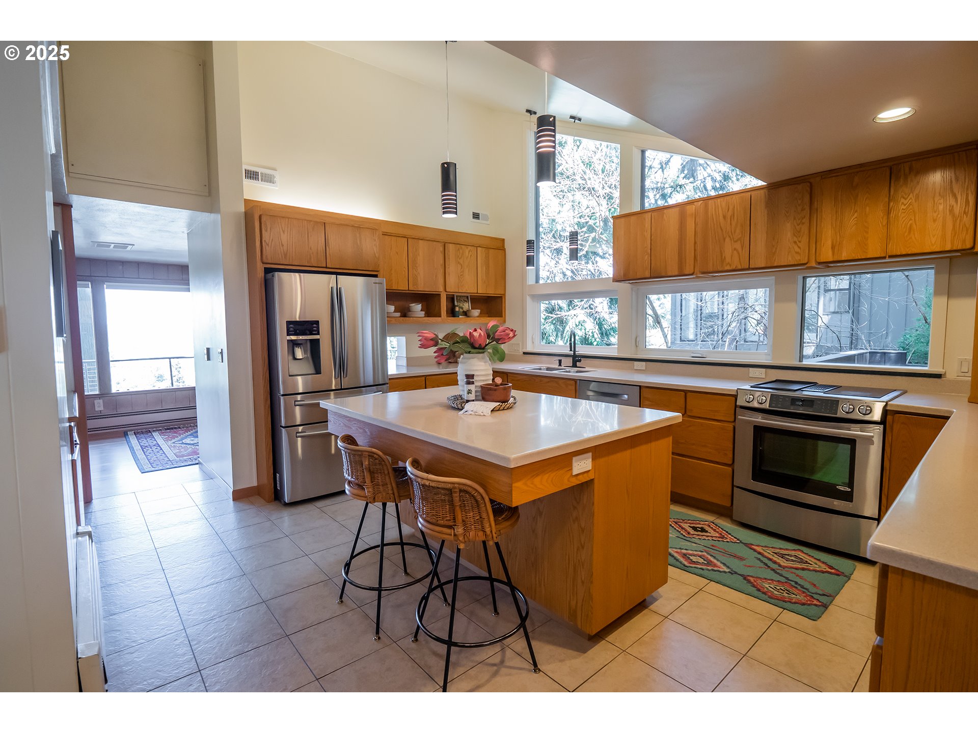 275 Sunset Drive Eugene, OR 97403 - Photo 11 of 45 a kitchen with a sink cabinets and window