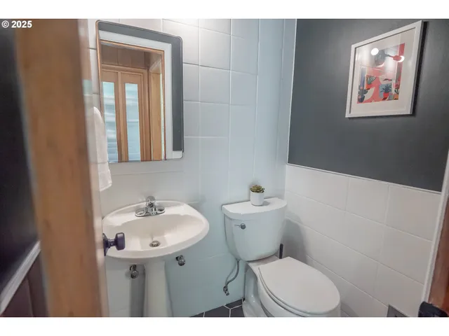 a bedroom with a bed and a cabinets