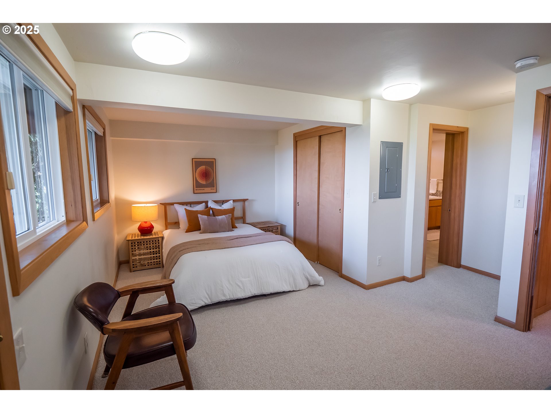 275 Sunset Drive Eugene, OR 97403 - Photo 21 of 45 a bedroom with a bed and a cabinets