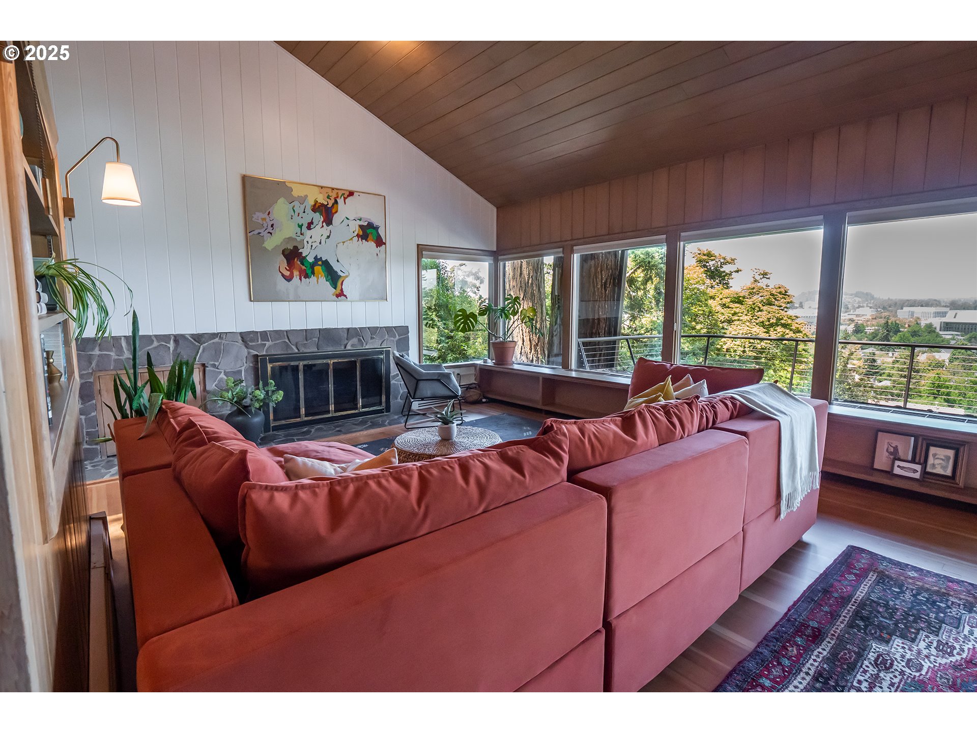 275 Sunset Drive Eugene, OR 97403 - Photo 3 of 45 a living room with furniture large window and a fireplace