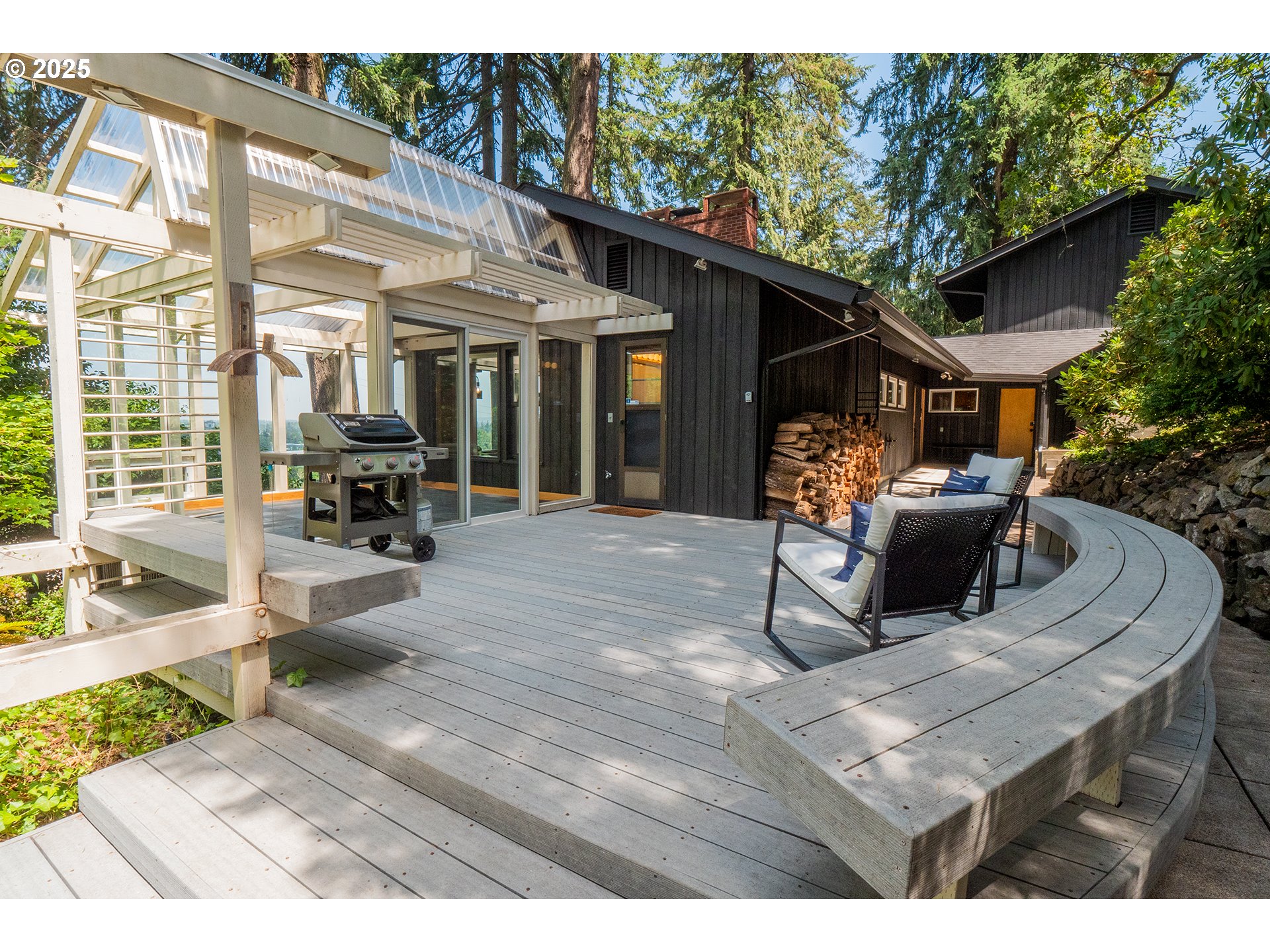 275 Sunset Drive Eugene, OR 97403 - Photo 33 of 45 a view of a patio with table and chairs potted plants with wooden floor
