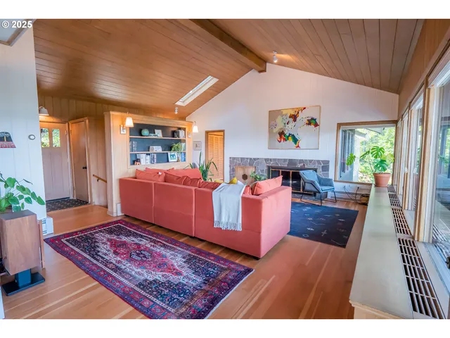 a living room with furniture and a rug