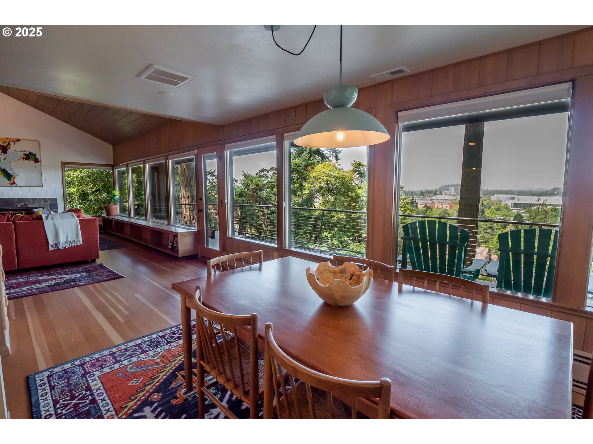 275 Sunset Drive Eugene, OR 97403 - Photo 8 of 45 a view of a dining room with furniture wooden floor and chandelier