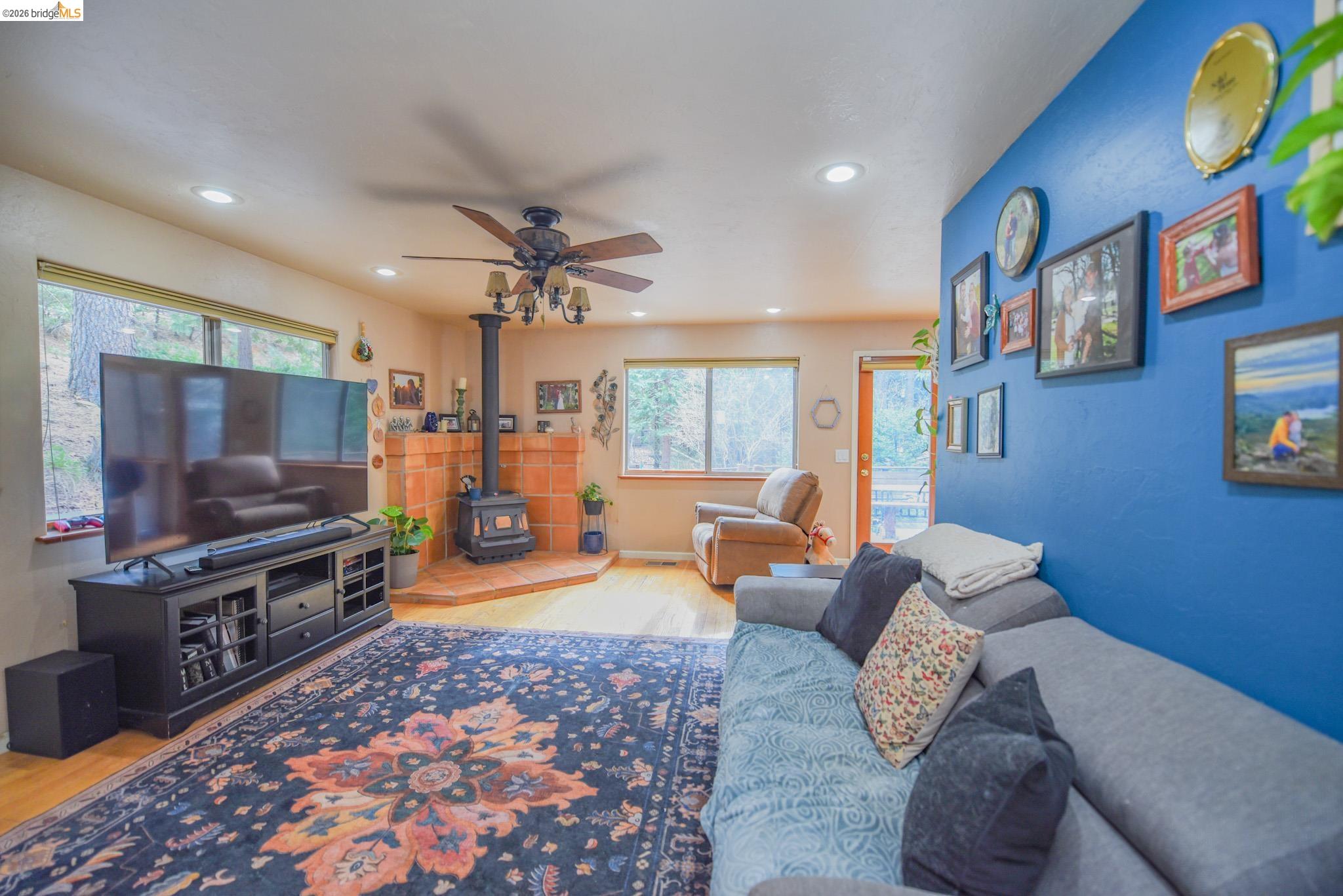 24132 Awahanee Road Sonora, CA 95370 - Photo 5 of 39 a living room with furniture and a flat screen tv