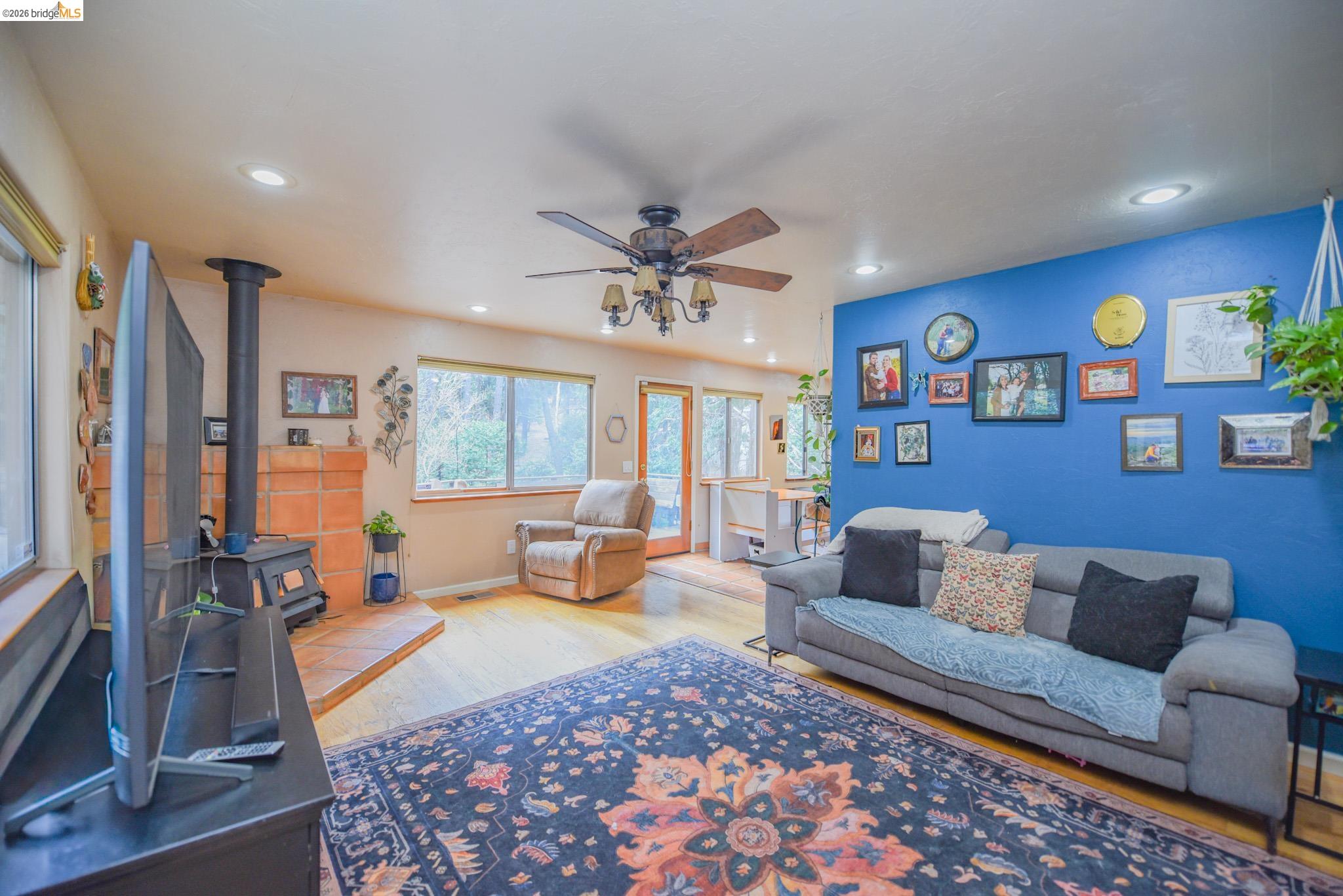 24132 Awahanee Road Sonora, CA 95370 - Photo 6 of 39 a living room with furniture and a large window
