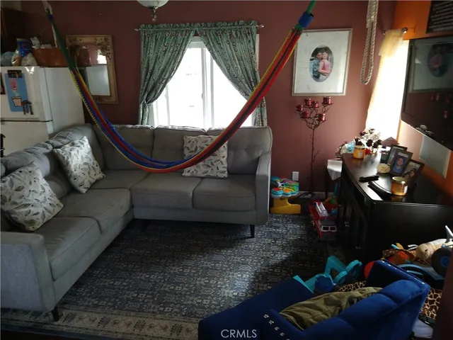 a living room filled with furniture
