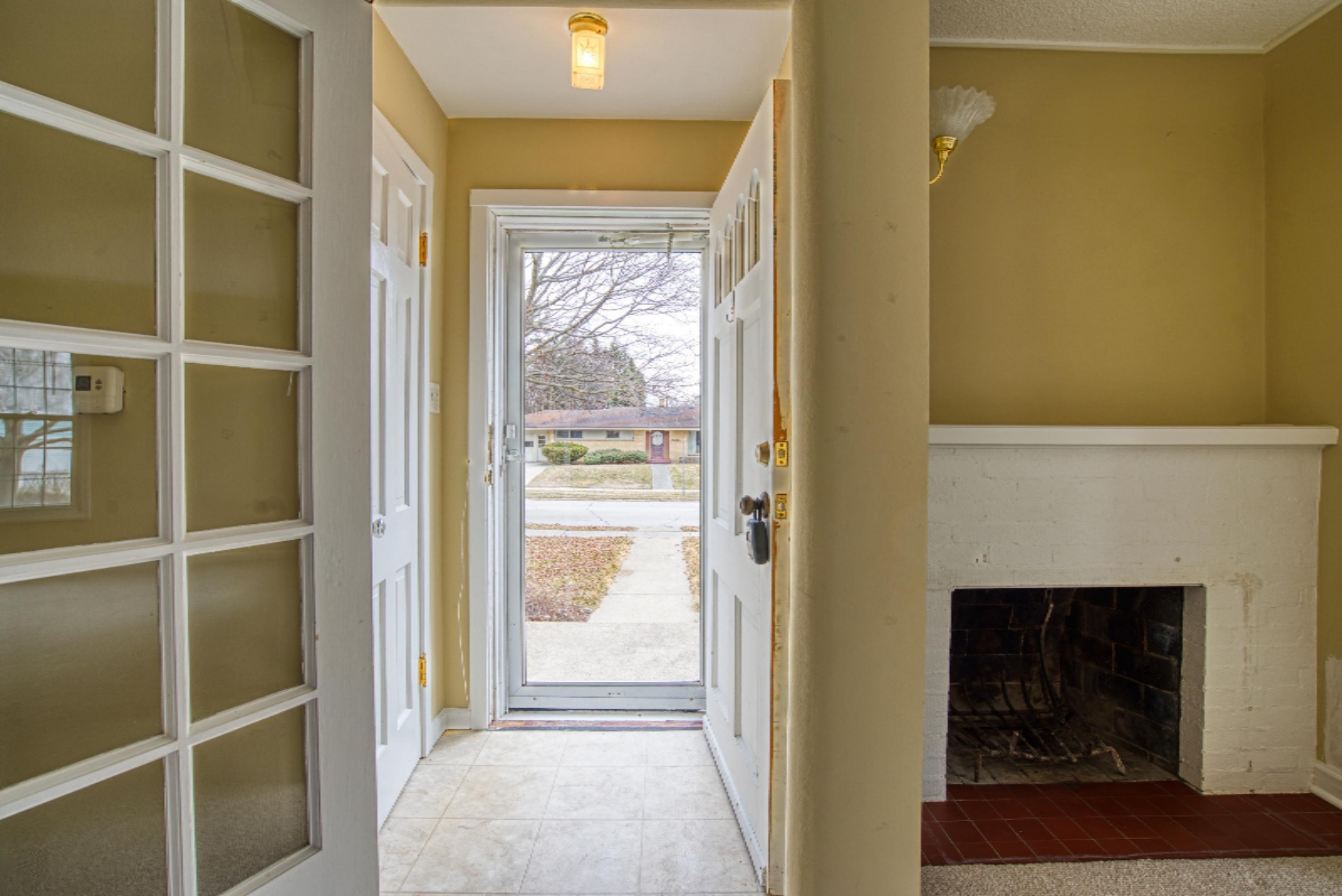 1523 Sheldon Road Grand Haven, MI 49417 - Photo 8 of 34 10. Front Door Reverse
