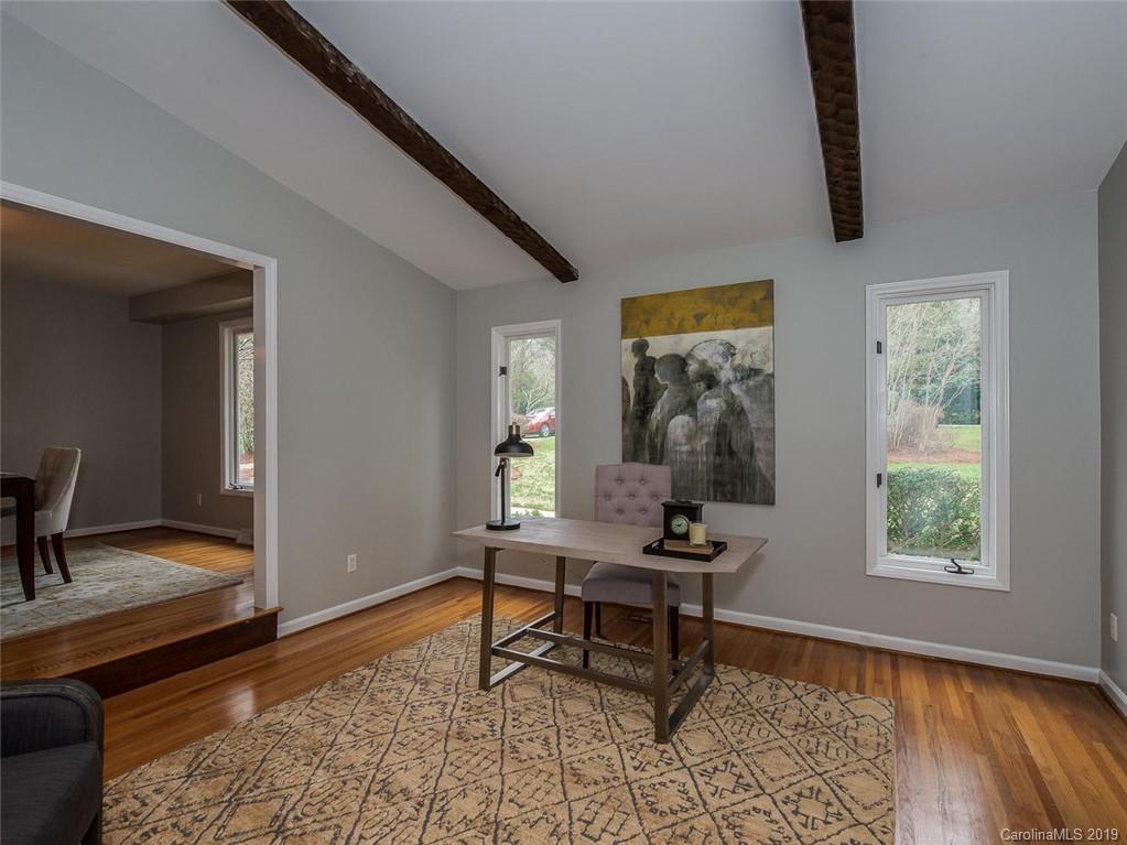 3437 High Ridge Road Charlotte, NC 28270 - Photo 4 of 23 a view of a livingroom with workspace and a window