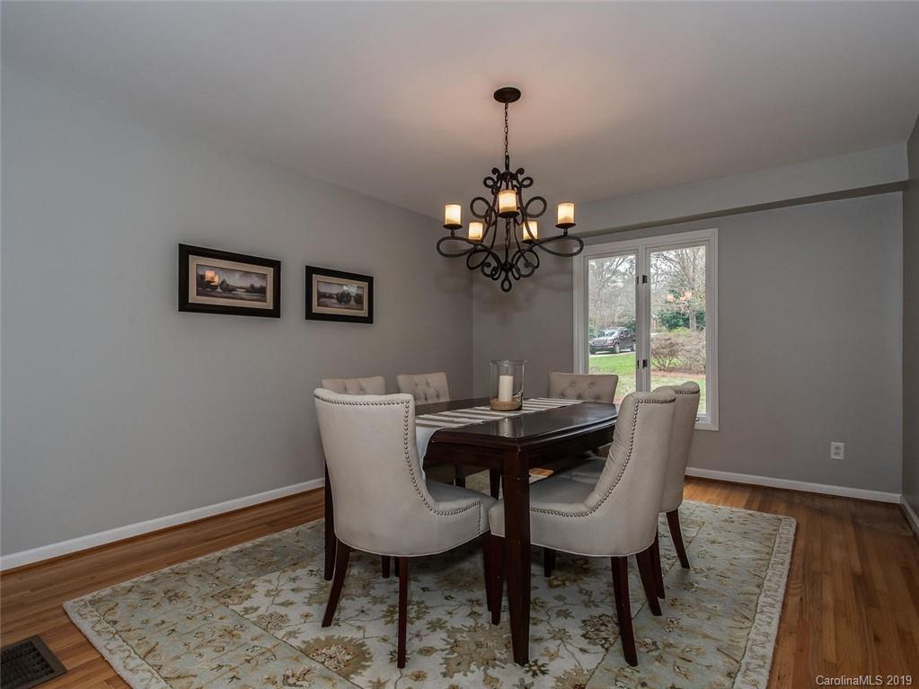 3437 High Ridge Road Charlotte, NC 28270 - Photo 5 of 23 a dining room with furniture and chandelier