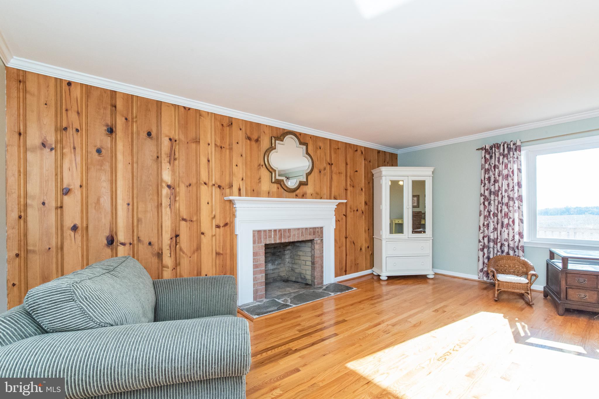3850 Davis Corner Road Street, MD 21154 - Photo 22 of 57 Wood Accented Wall and Mantel