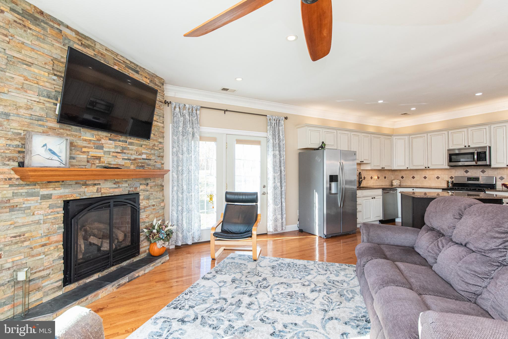 3850 Davis Corner Road Street, MD 21154 - Photo 43 of 57 In-Law Suite with Stacked Stone Hearth and Mantle