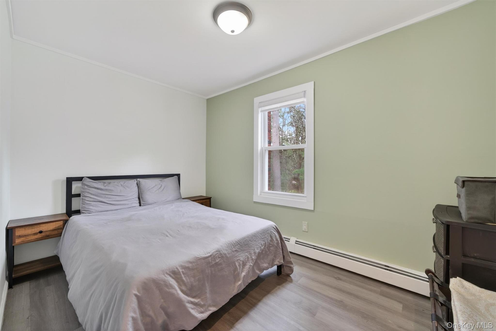 86 Beaver Brook Road Narrowsburg, NY 12764 - Photo 14 of 48 a bedroom with a bed and a window