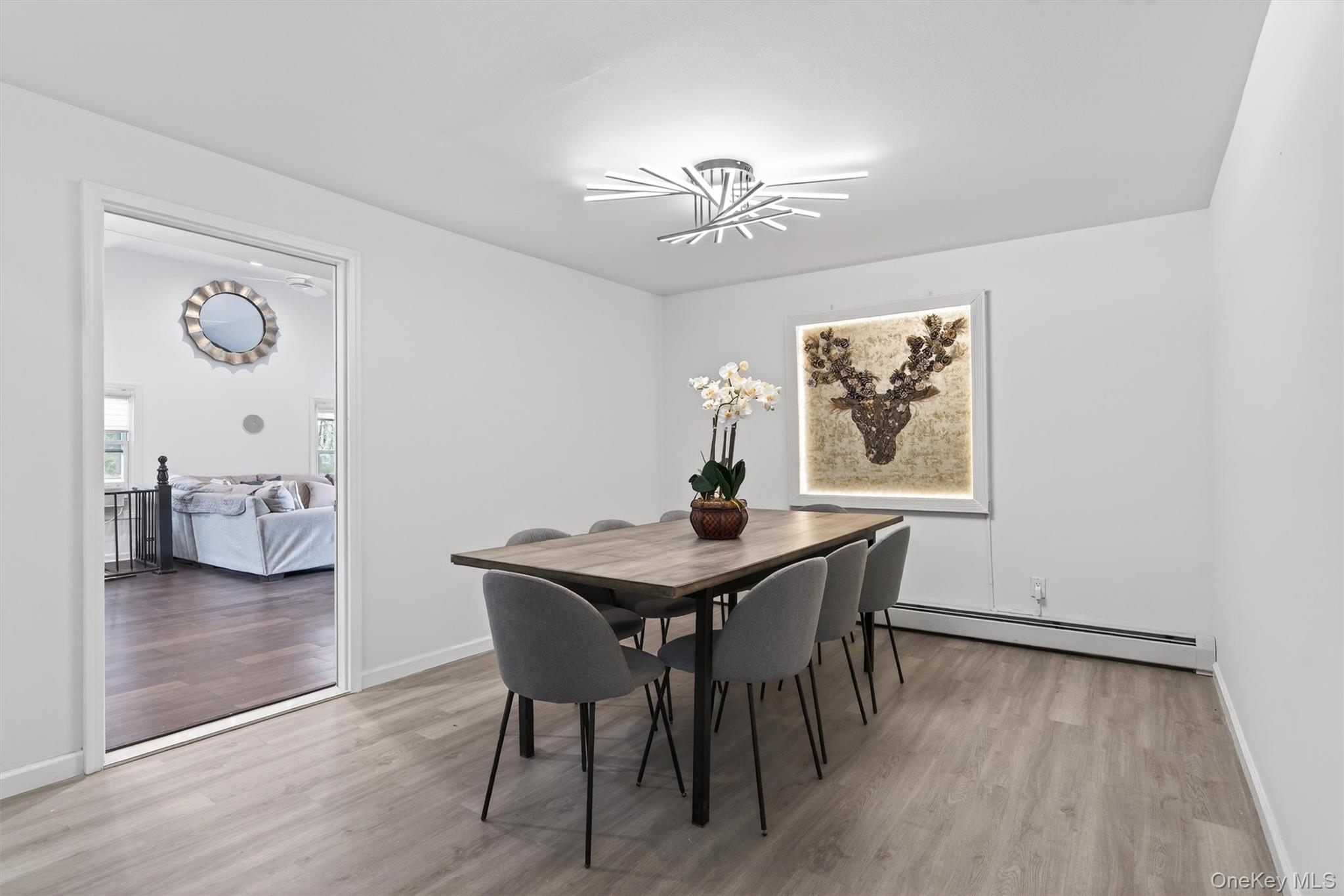 86 Beaver Brook Road Narrowsburg, NY 12764 - Photo 20 of 48 a view of a dining room with furniture and wooden floor