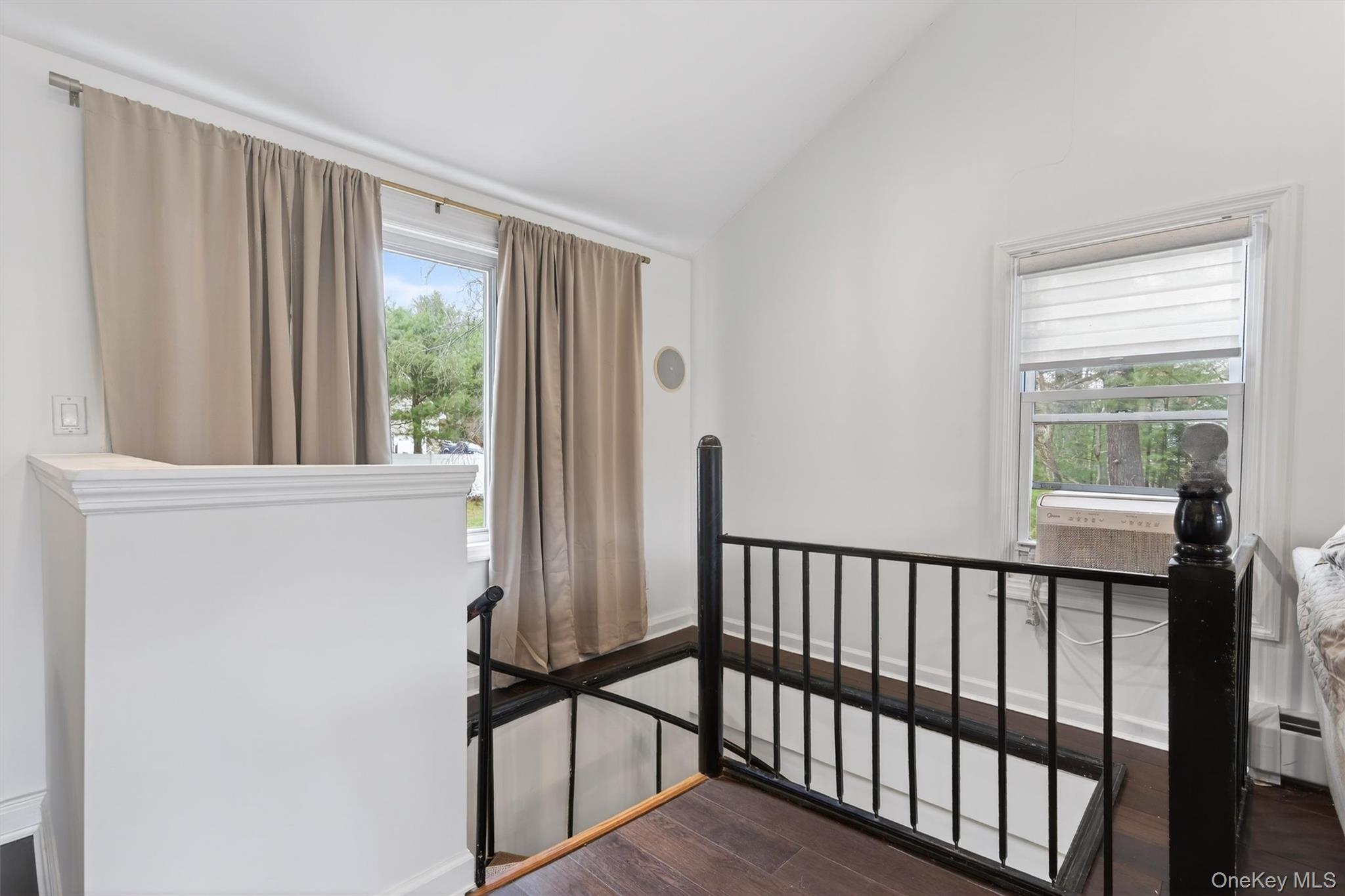 86 Beaver Brook Road Narrowsburg, NY 12764 - Photo 22 of 41 spial stairs to family room from living room. There's another staircase down