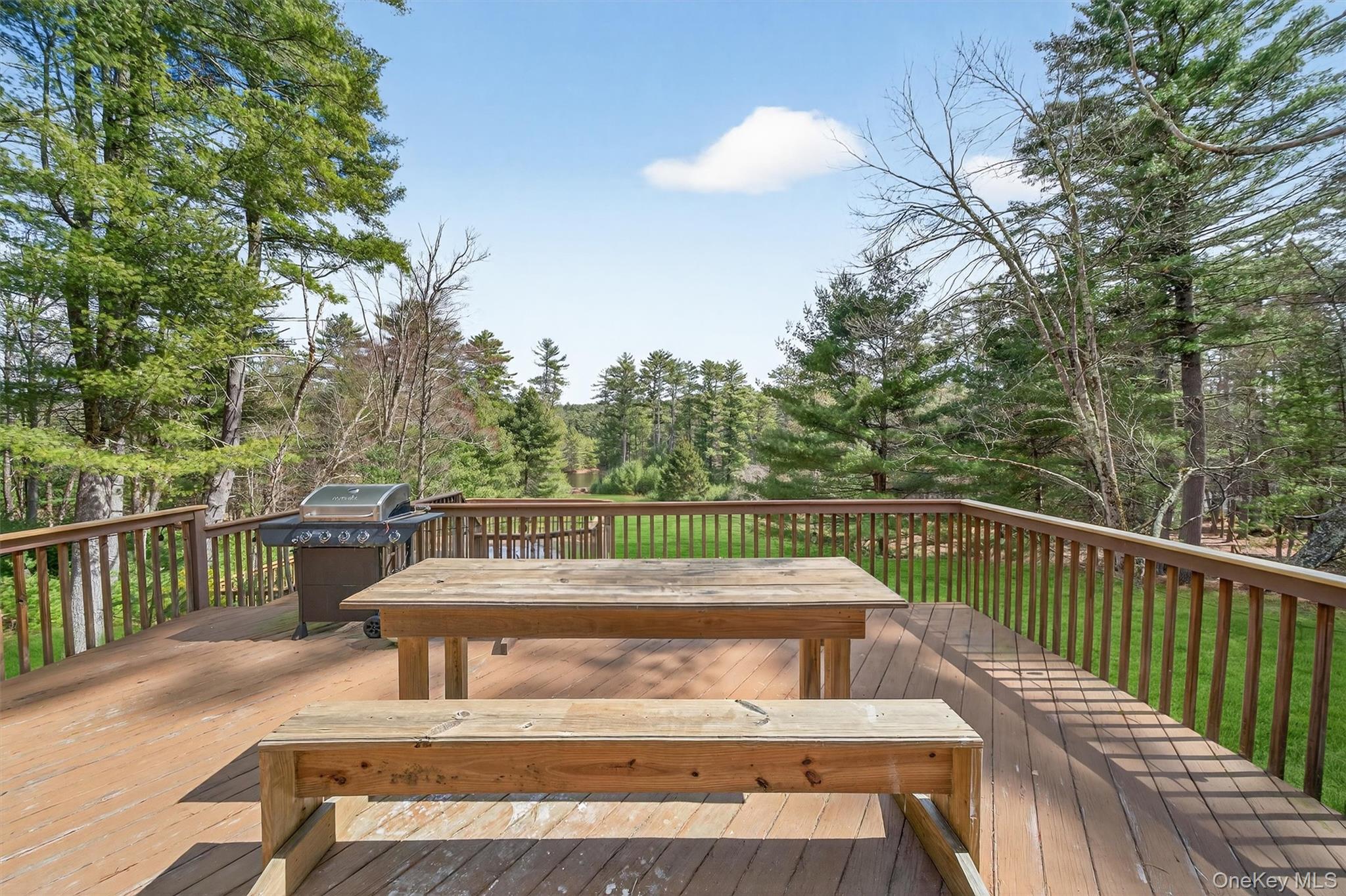 86 Beaver Brook Road Narrowsburg, NY 12764 - Photo 41 of 48 a view of balcony with wooden floor and fence