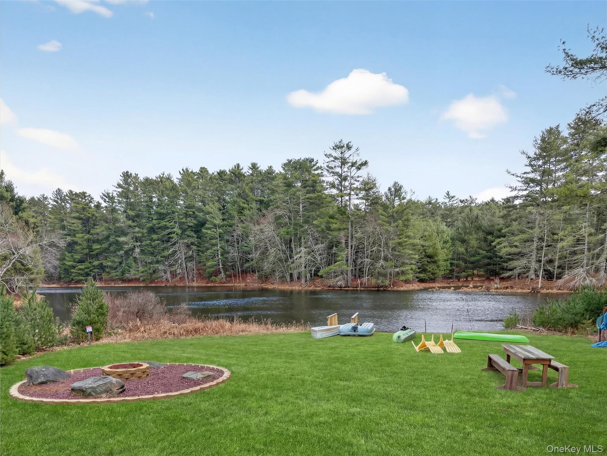 86 Beaver Brook Road Narrowsburg, NY 12764 - Photo 43 of 48 a view of a golf course with a lake