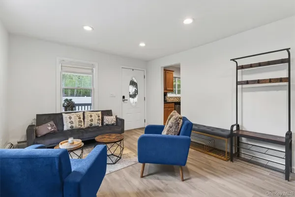a kitchen with stainless steel appliances granite countertop a refrigerator sink and cabinets