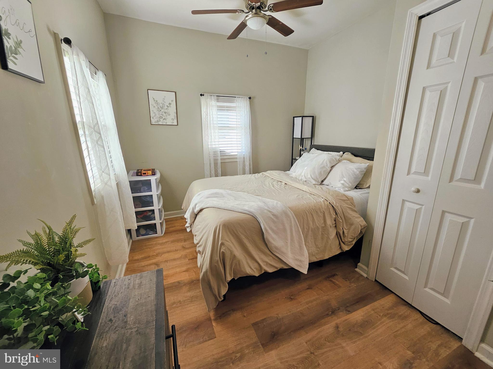 53 Jackson Road Penns Grove, NJ 08069 - Photo 12 of 24 a bedroom with a bed window and a table