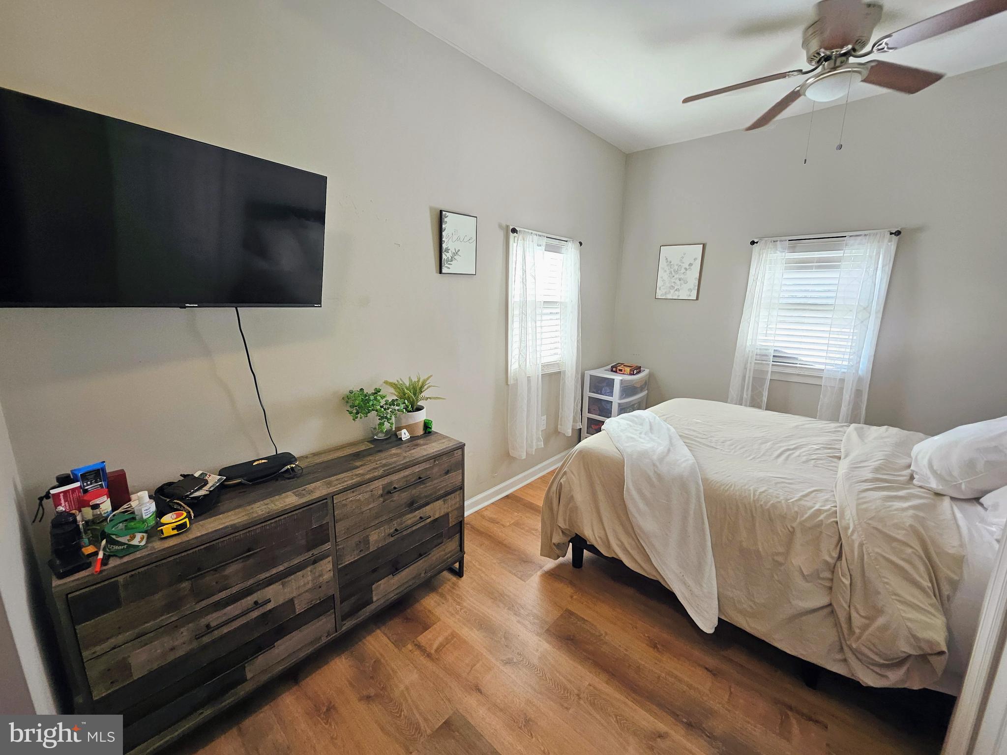 53 Jackson Road Penns Grove, NJ 08069 - Photo 13 of 24 a bedroom with a bed and a flat screen tv