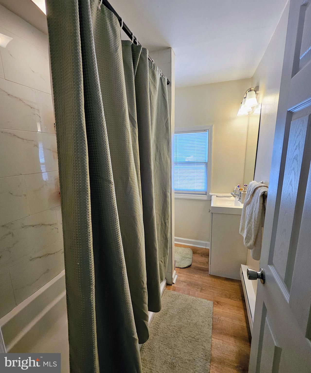 53 Jackson Road Penns Grove, NJ 08069 - Photo 14 of 24 a bathroom with a sink a toilet a tub and shower