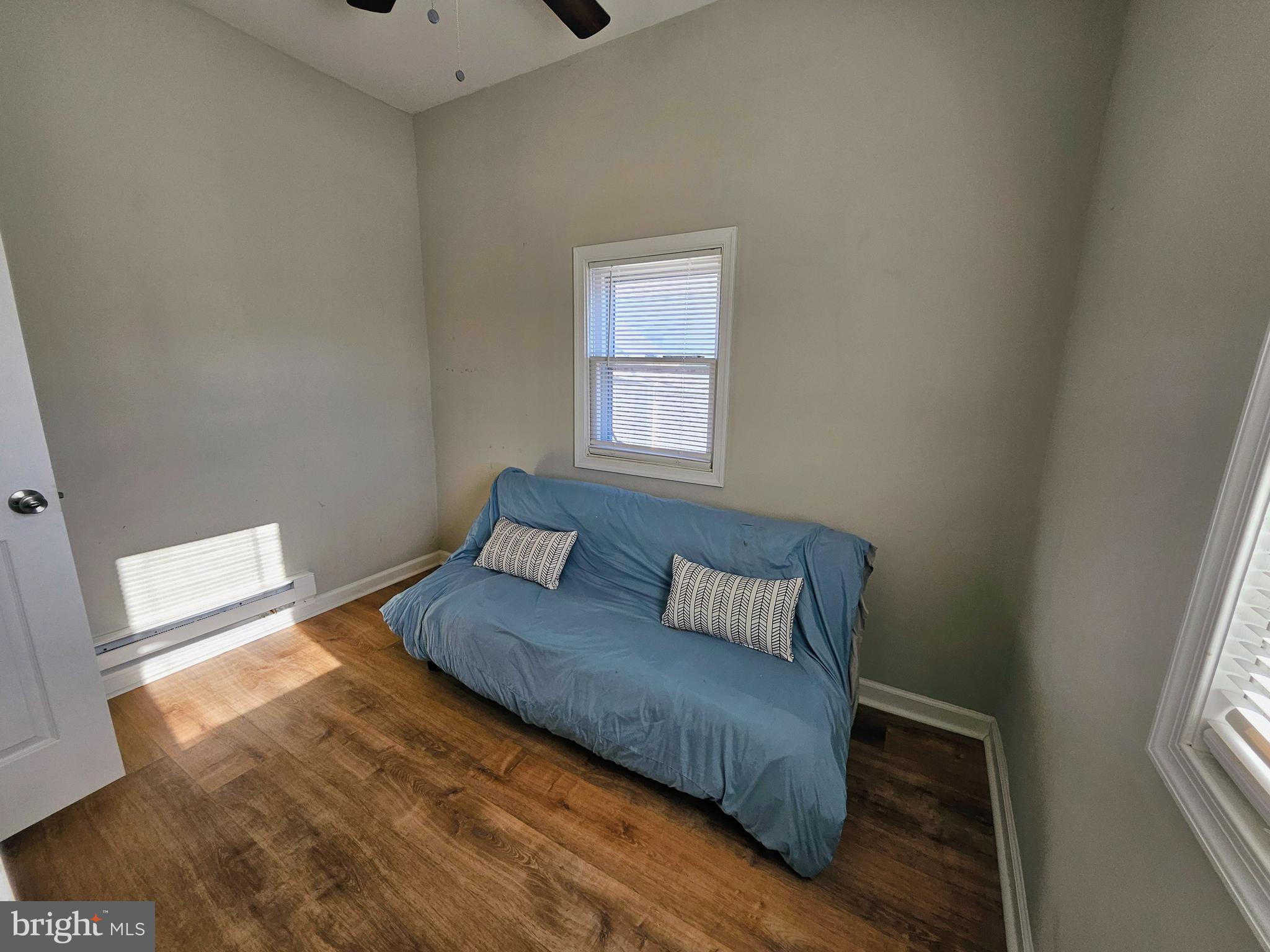 53 Jackson Road Penns Grove, NJ 08069 - Photo 15 of 24 a bedroom with a bed and a window