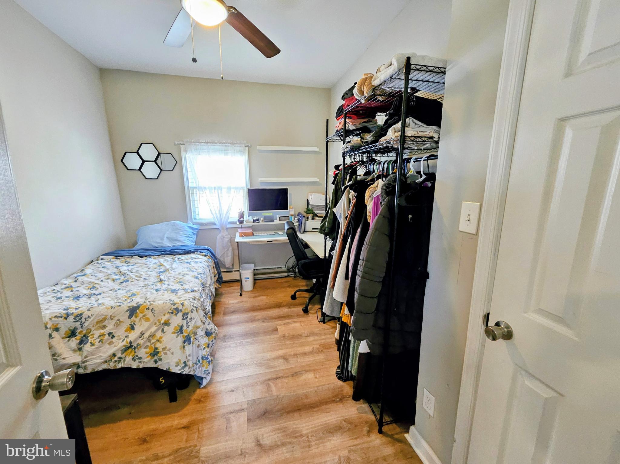 53 Jackson Road Penns Grove, NJ 08069 - Photo 16 of 24 a walk in closet with clothes and shoes